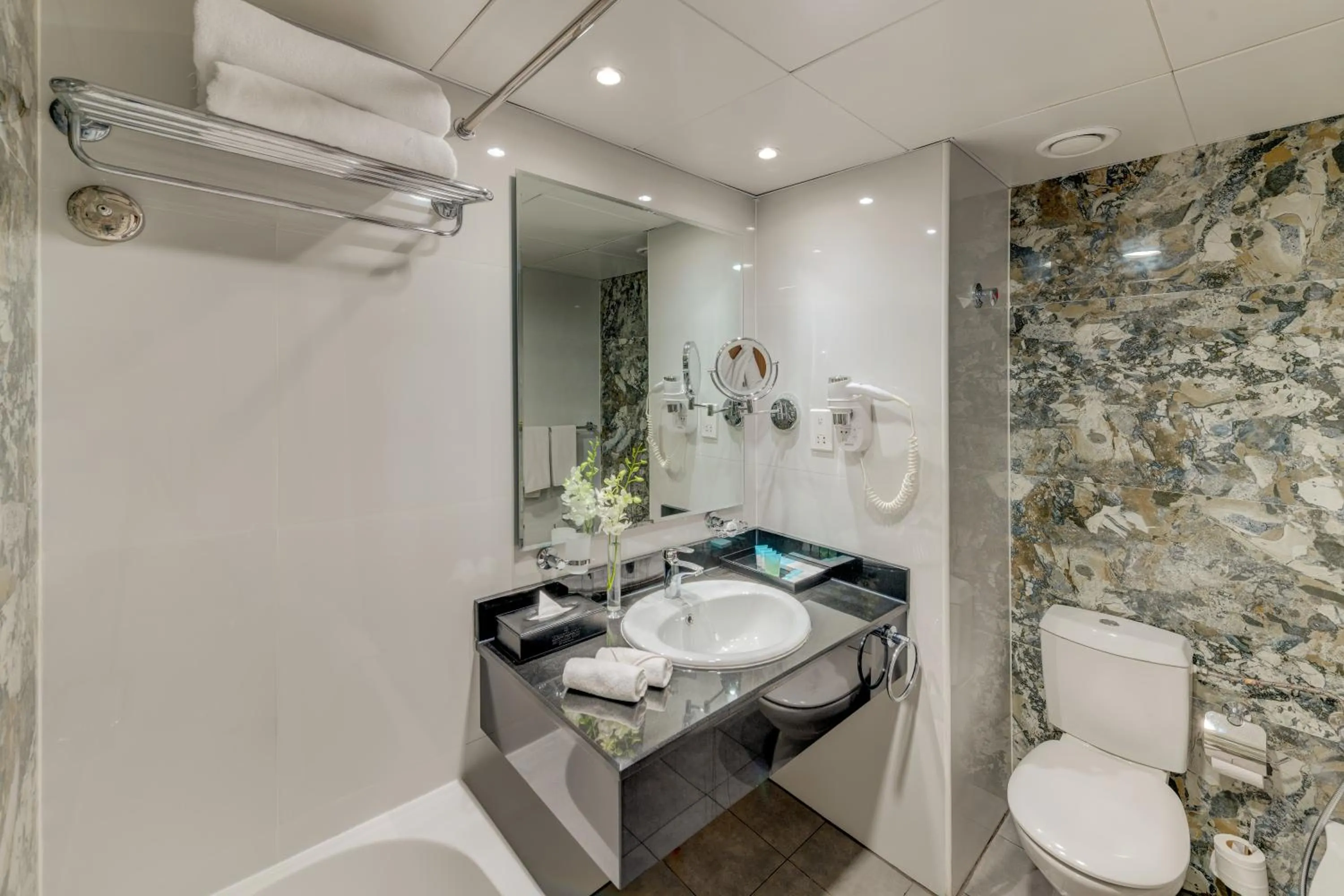 Shower in Hawthorn Suites by Wyndham Abu Dhabi City Center