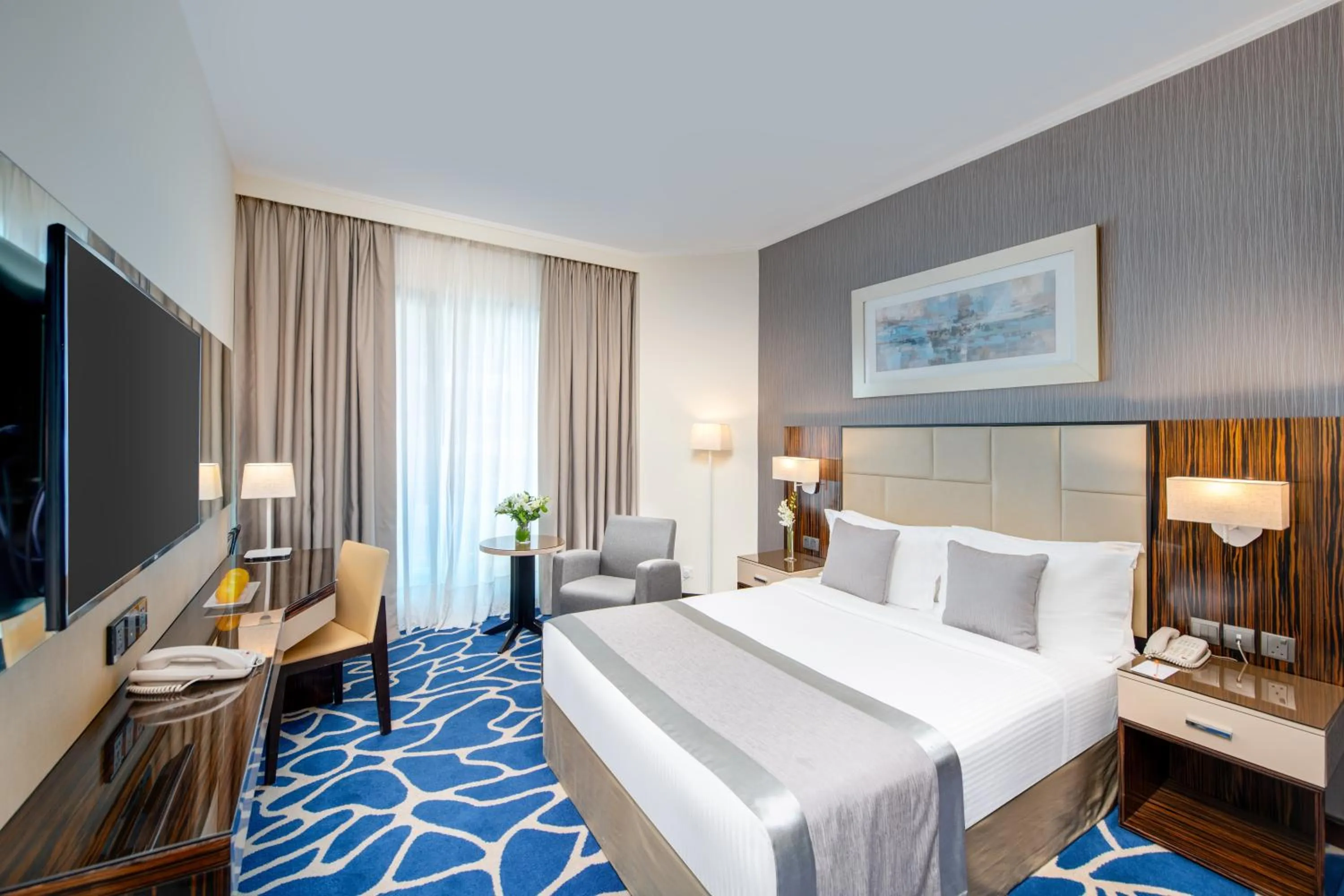 Bed in Hawthorn Suites by Wyndham Abu Dhabi City Center