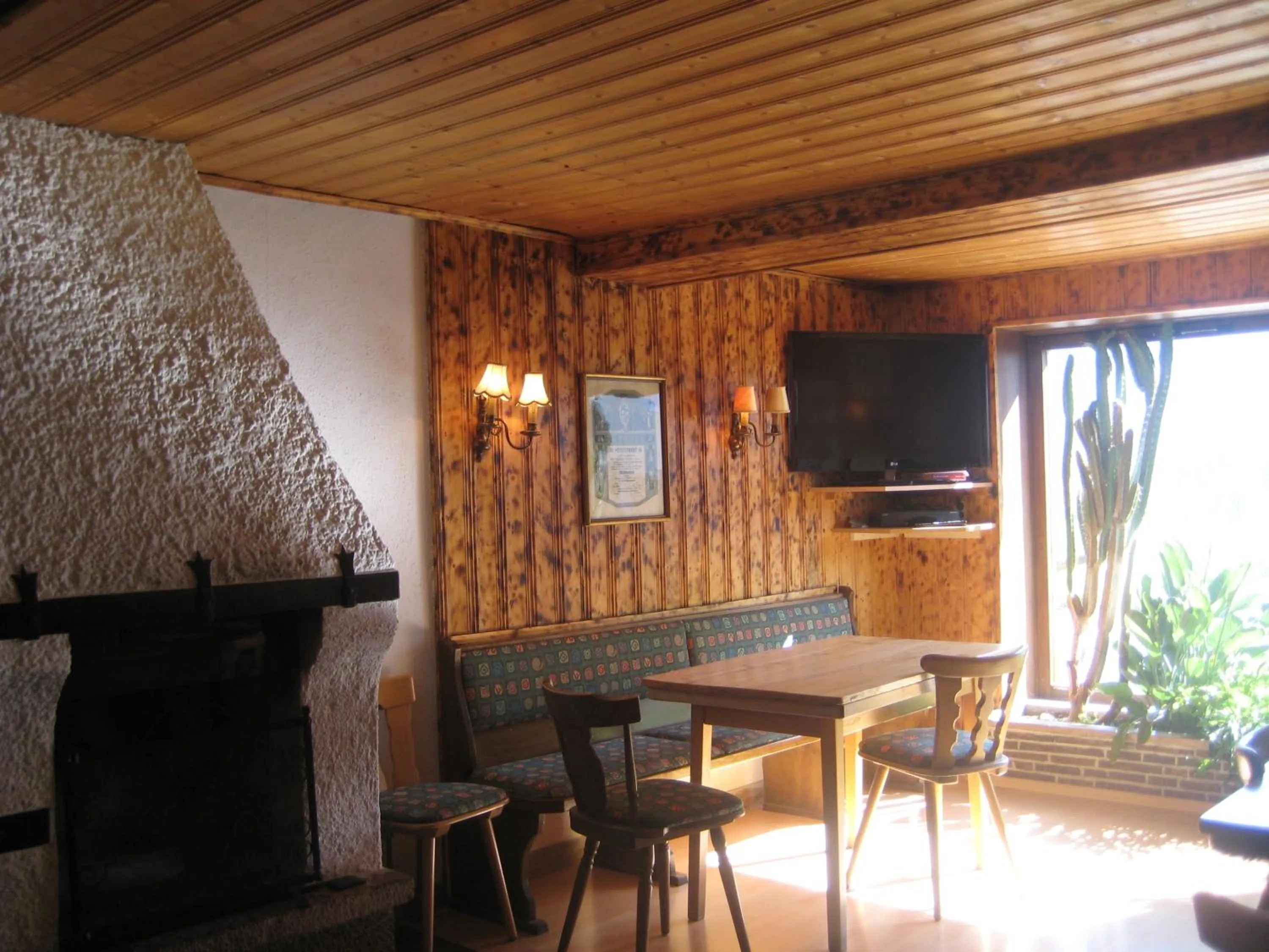 Communal lounge/ TV room in Sporthotel Schönau am Königssee