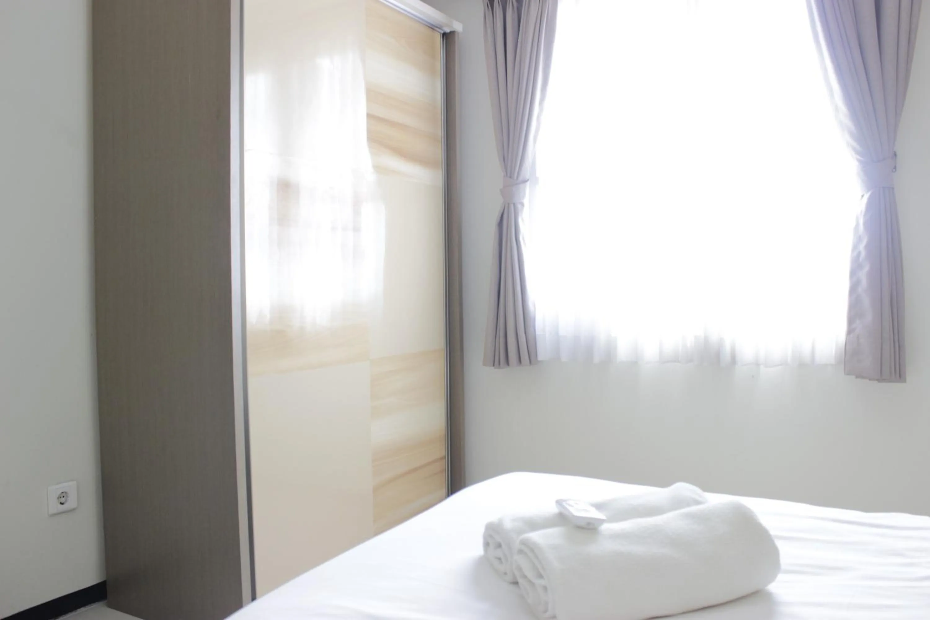 Bed in Spacious 2BR Apartment Gateway Pasteur near Exit Toll 23 By Travelio