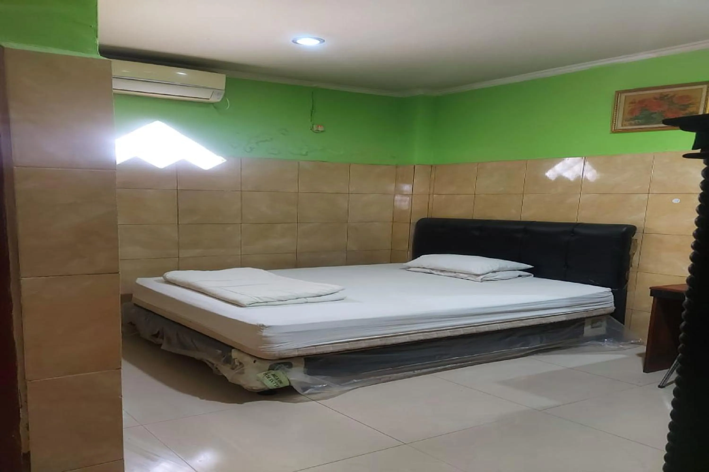 Bed in Hotel Mulia Kendari Mitra RedDoorz