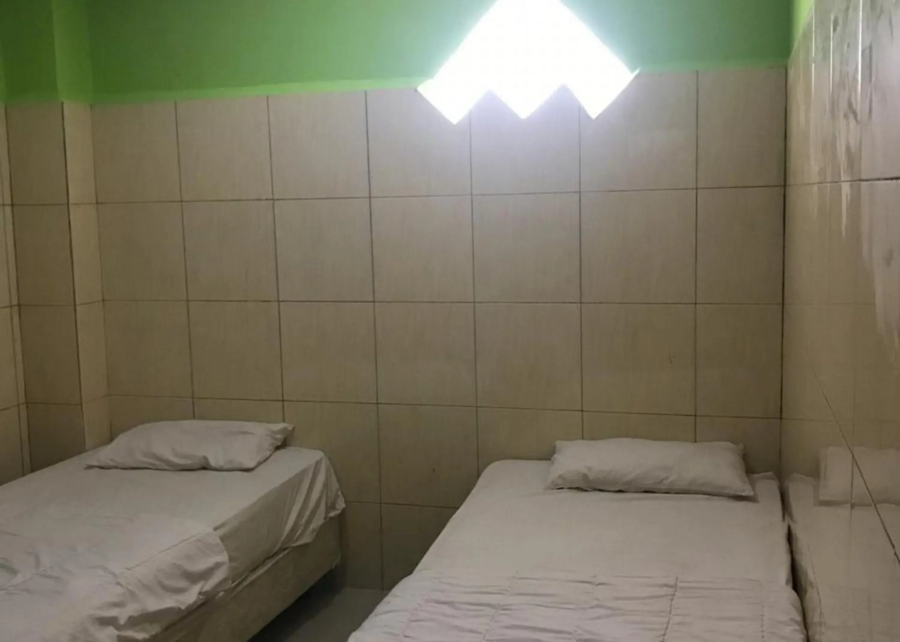 Bed in Hotel Mulia Kendari Mitra RedDoorz Bed in Hotel Mulia Kendari Mitra RedDoorz