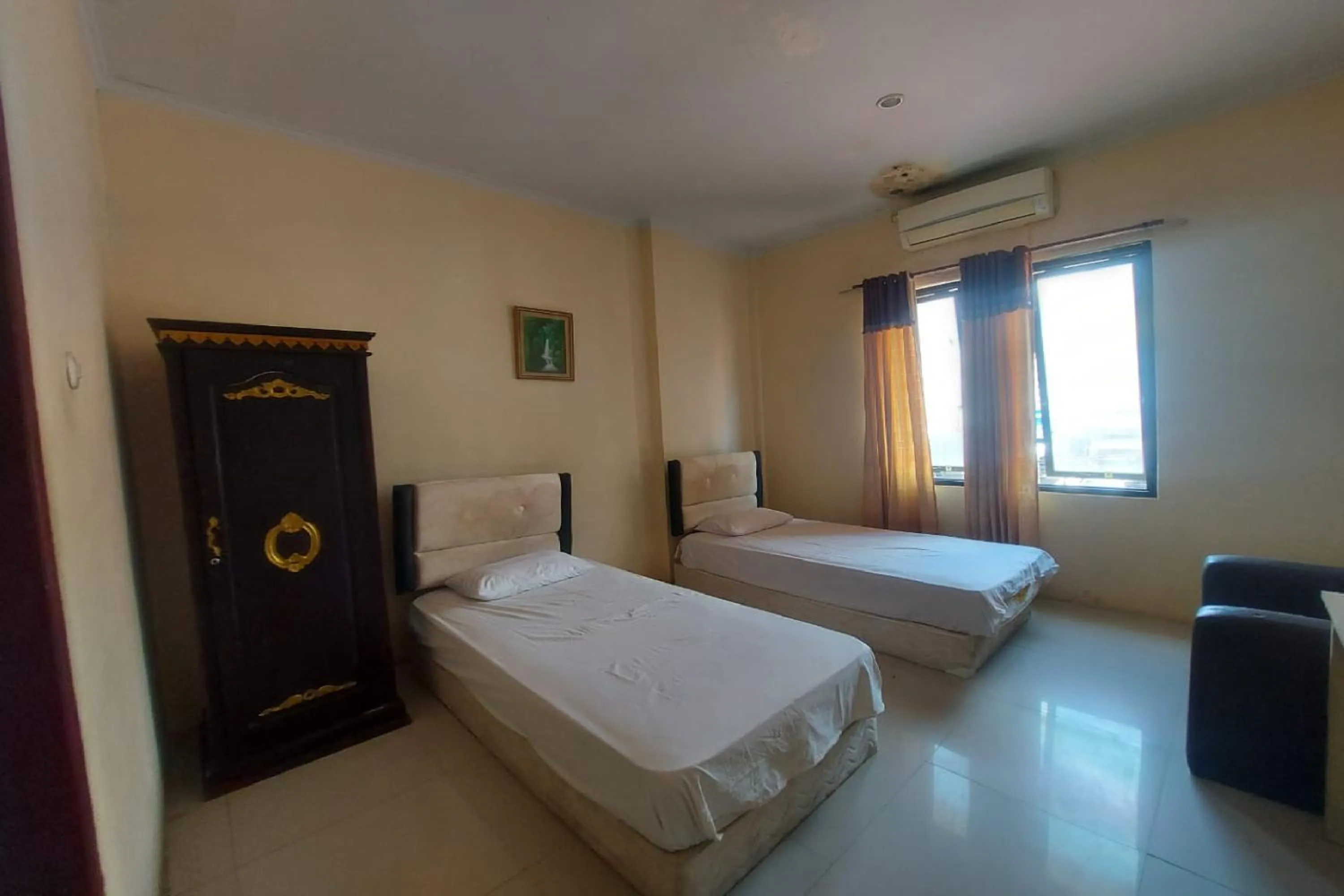 Bedroom, Bed in Hotel Mulia Kendari Mitra RedDoorz
