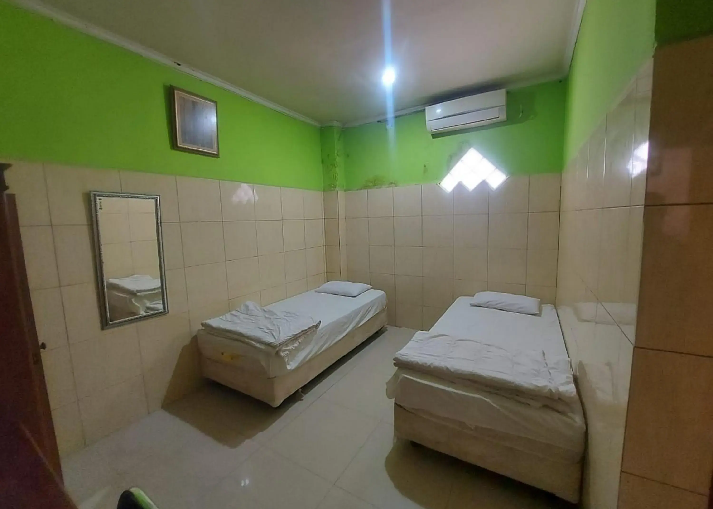 Bed in Hotel Mulia Kendari Mitra RedDoorz Bed in Hotel Mulia Kendari Mitra RedDoorz