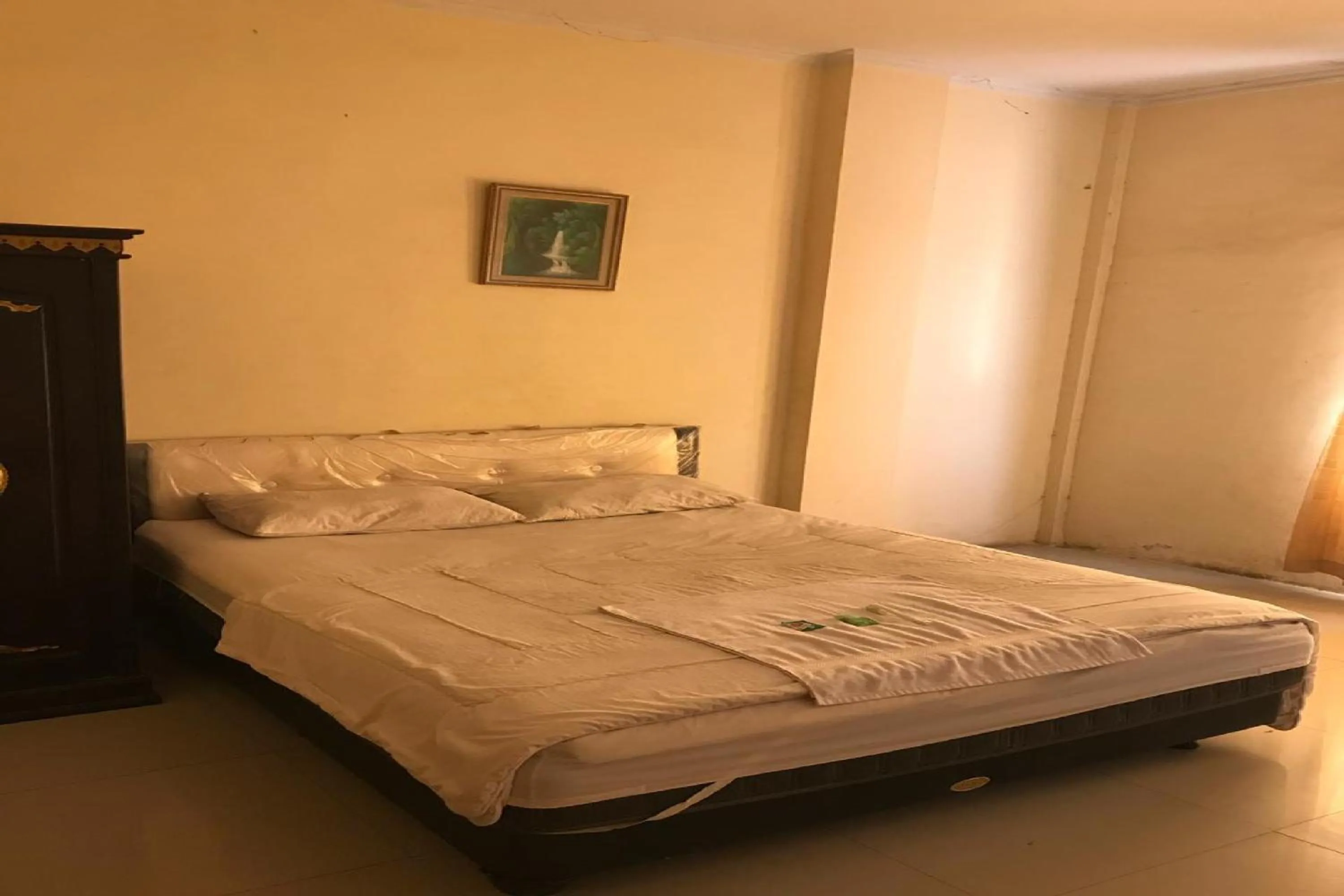 Bedroom, Bed in Hotel Mulia Kendari Mitra RedDoorz