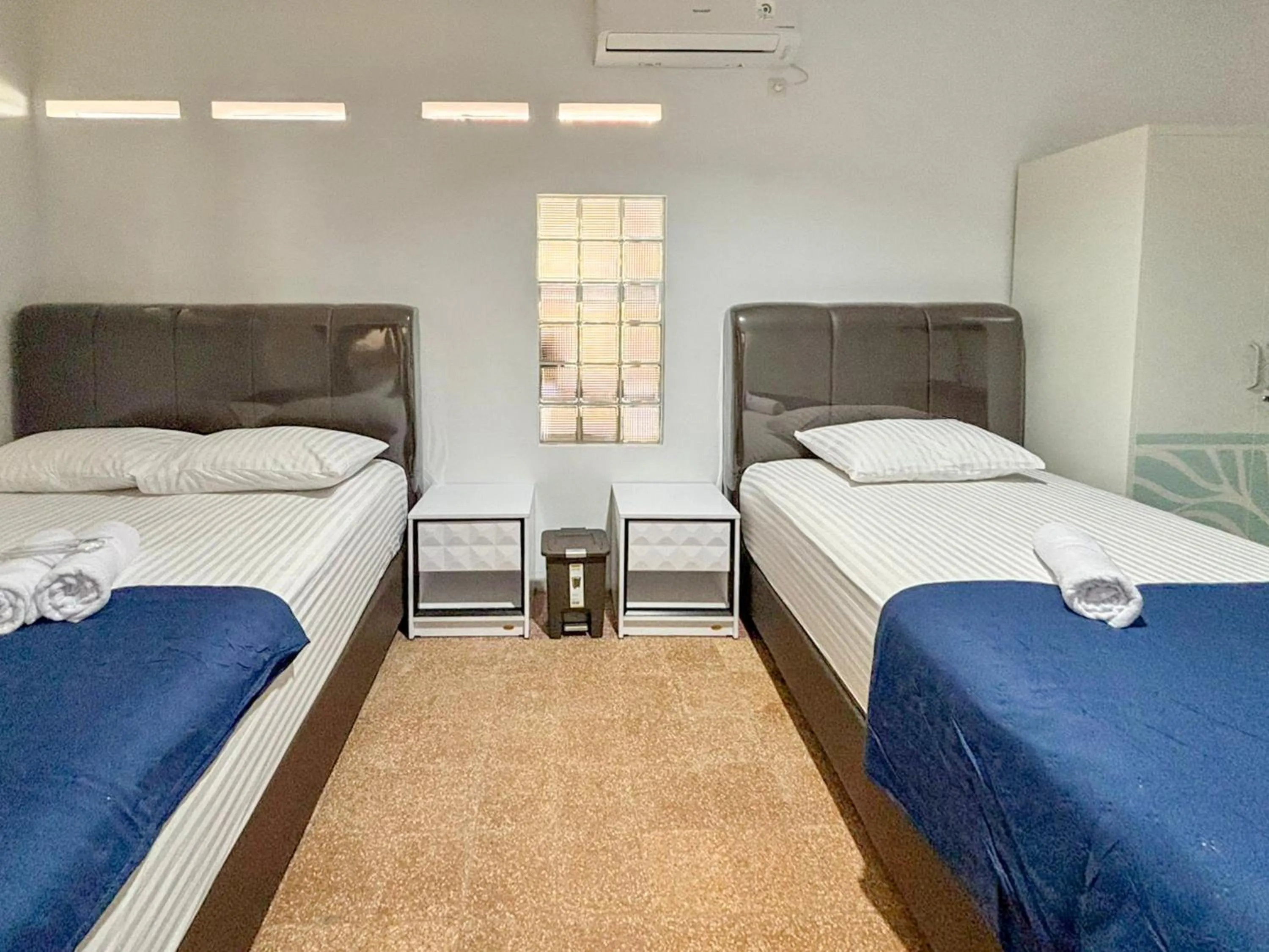 Bedroom, Bed in Tini's Guest House Malang Mitra RedDoorz