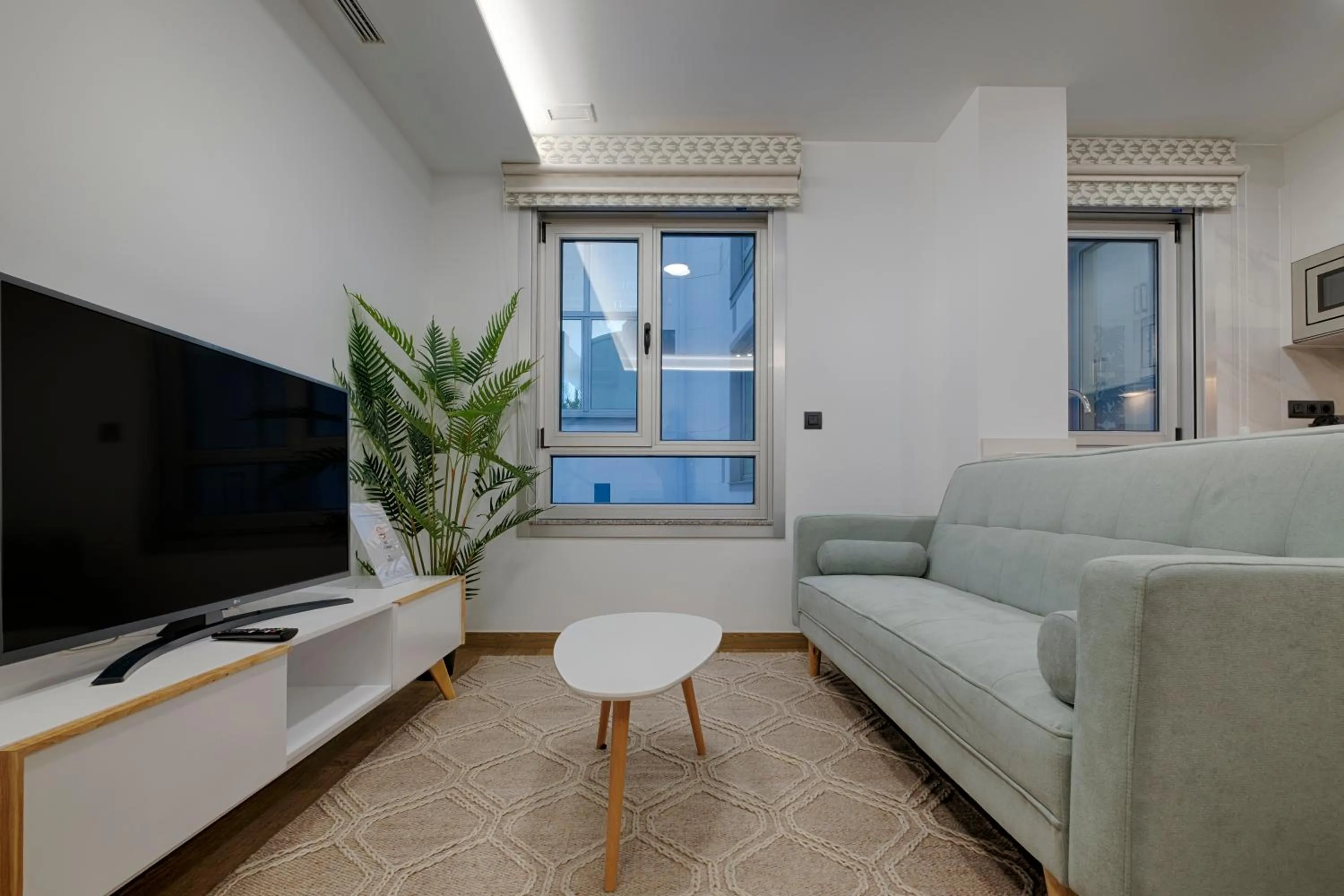 TV and multimedia in TH Apartments by Como en Casa