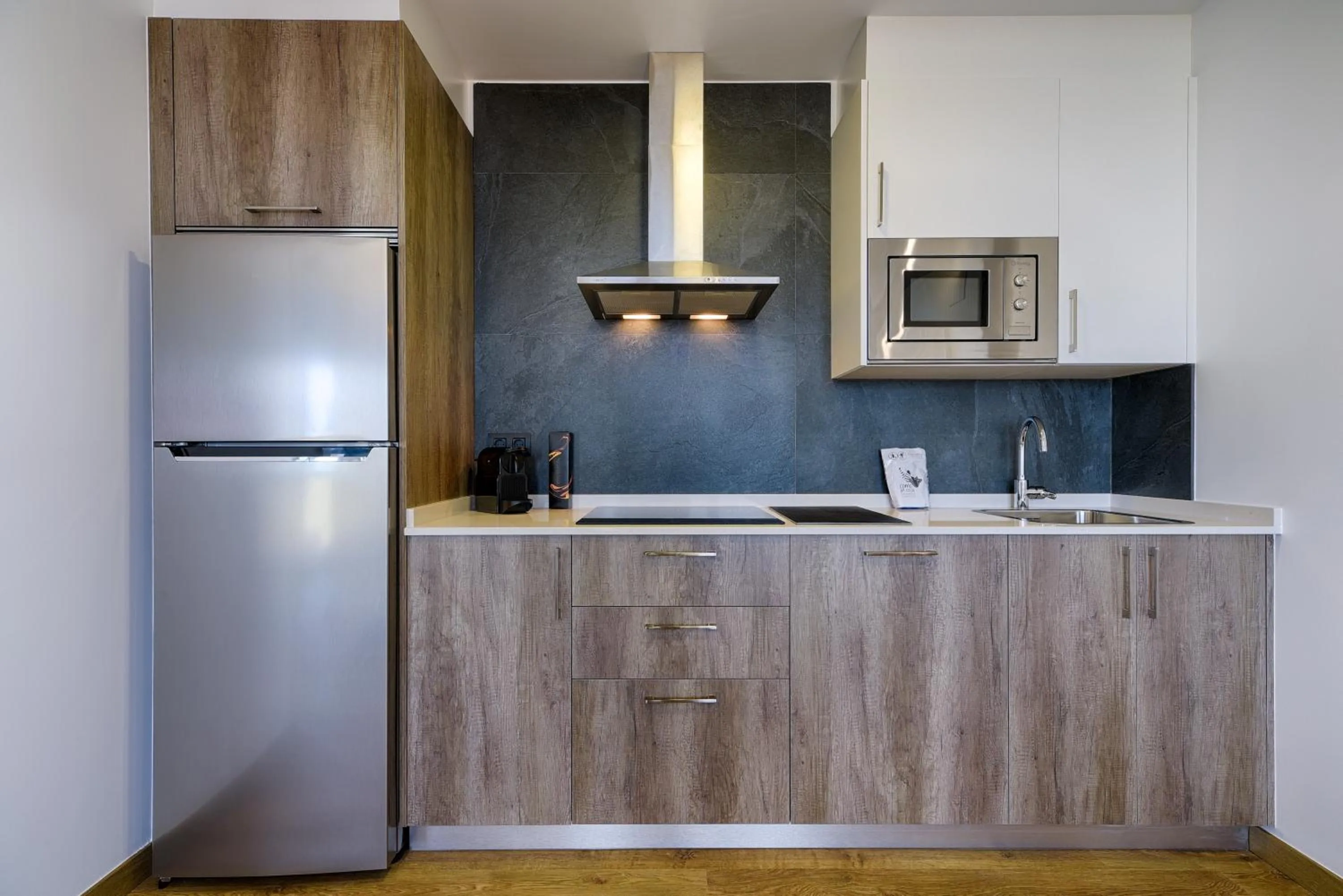 Kitchen or kitchenette in TH Apartments by Como en Casa