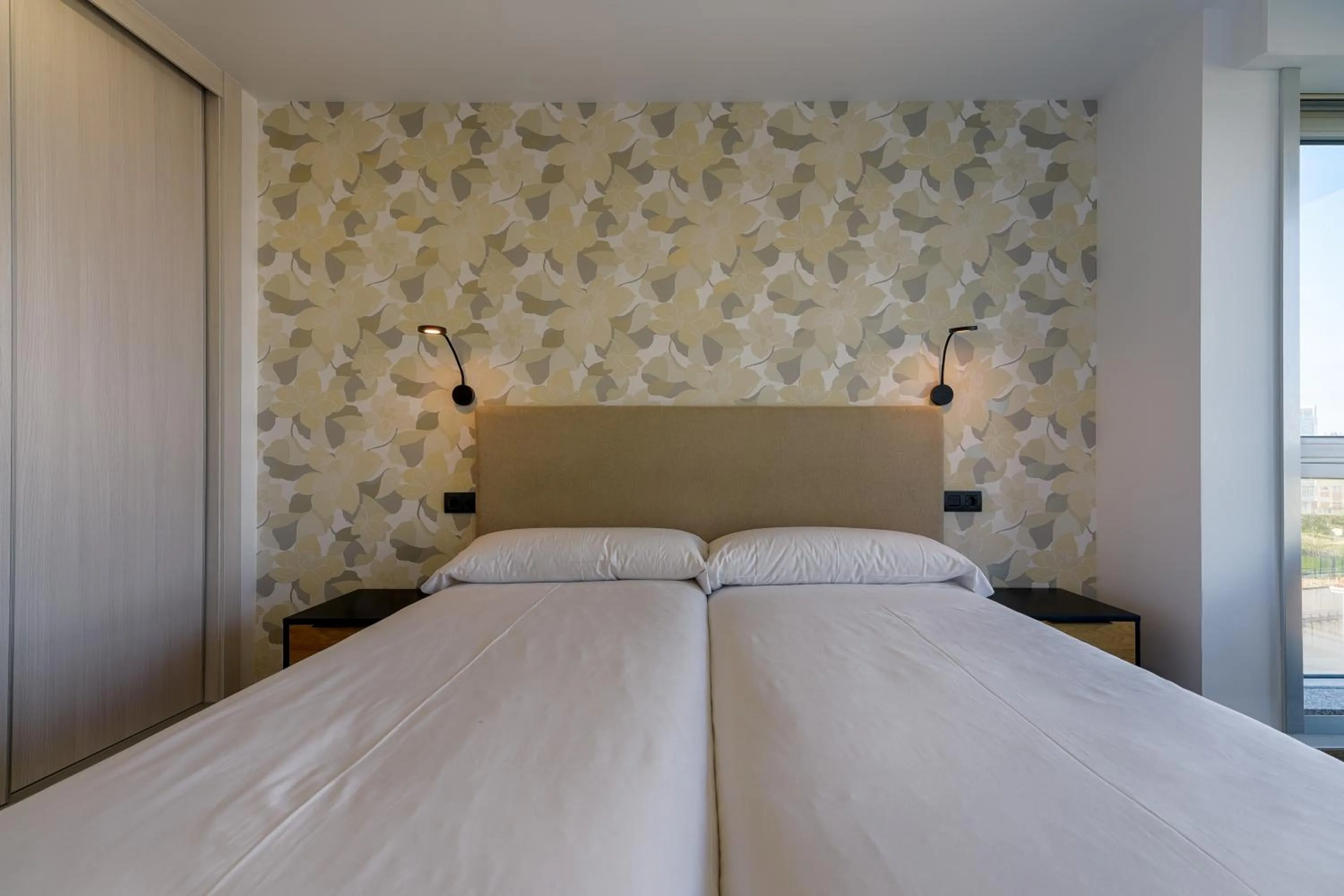 Bed in TH Apartments by Como en Casa