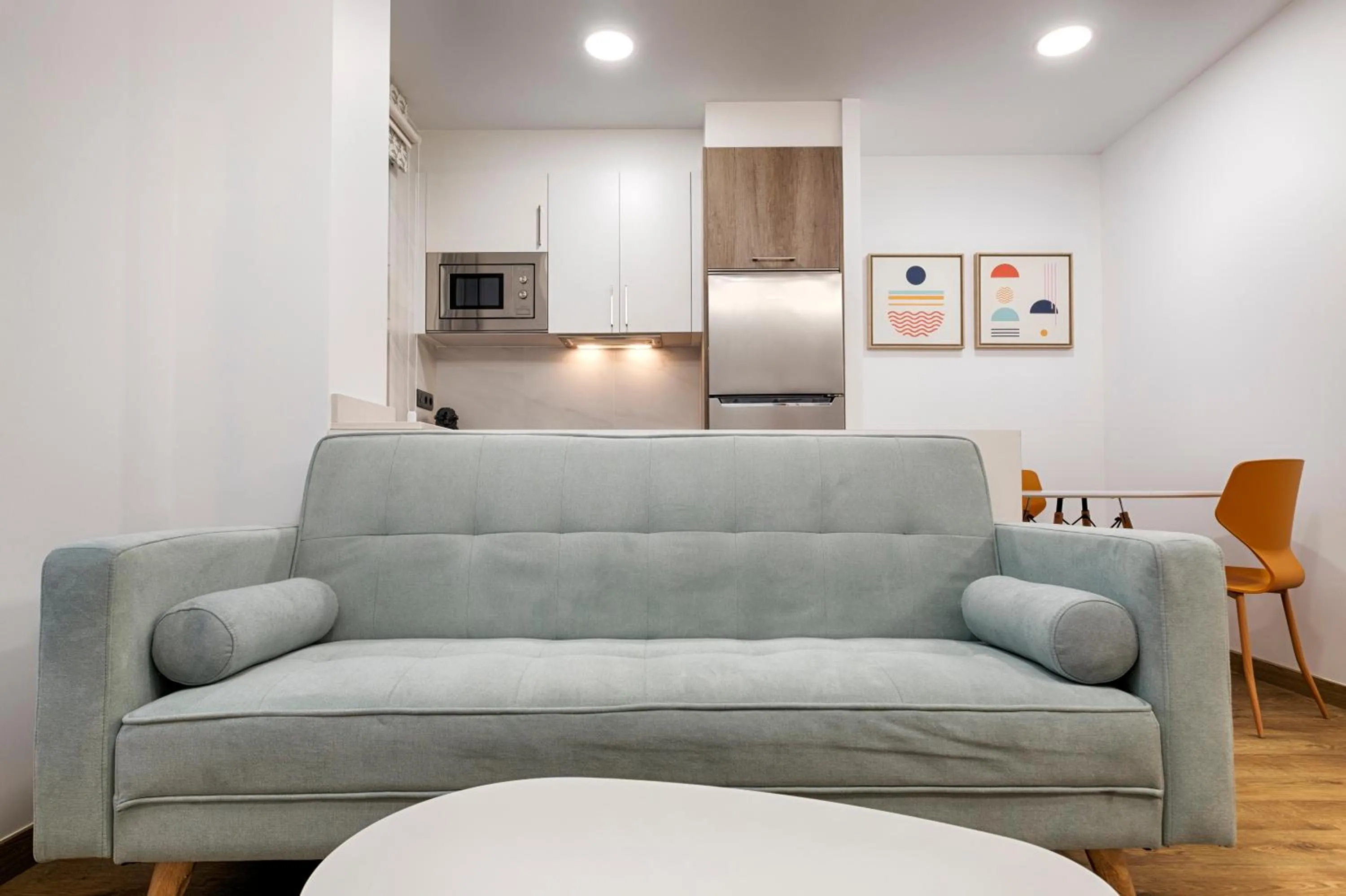 Living room in TH Apartments by Como en Casa