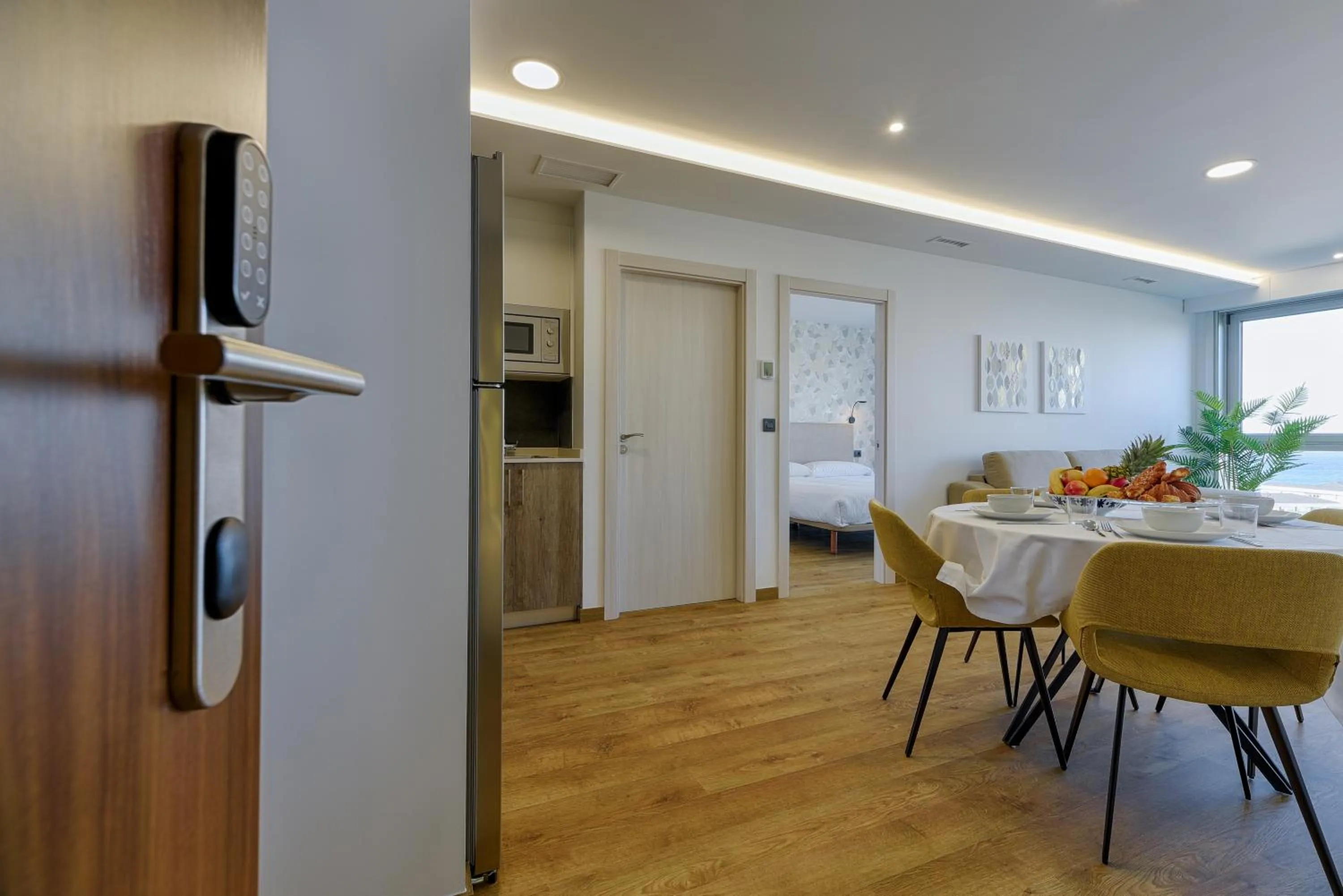 Facade/entrance in TH Apartments by Como en Casa