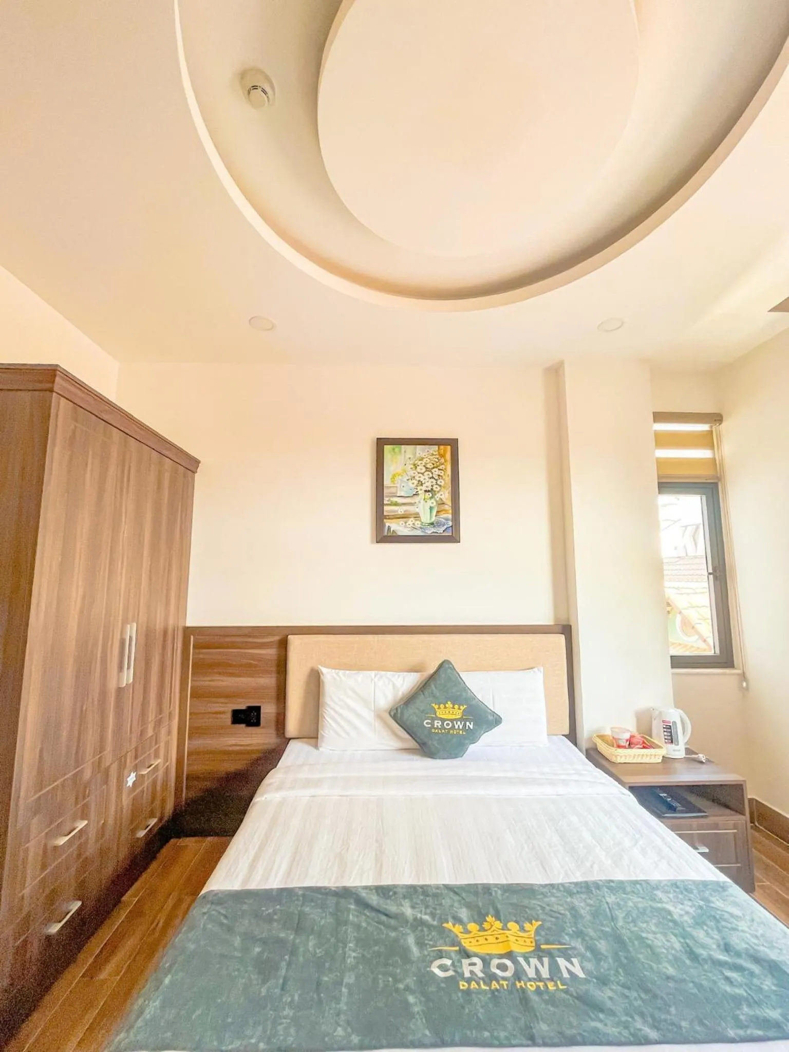 Bed in Crown Dalat Hotel