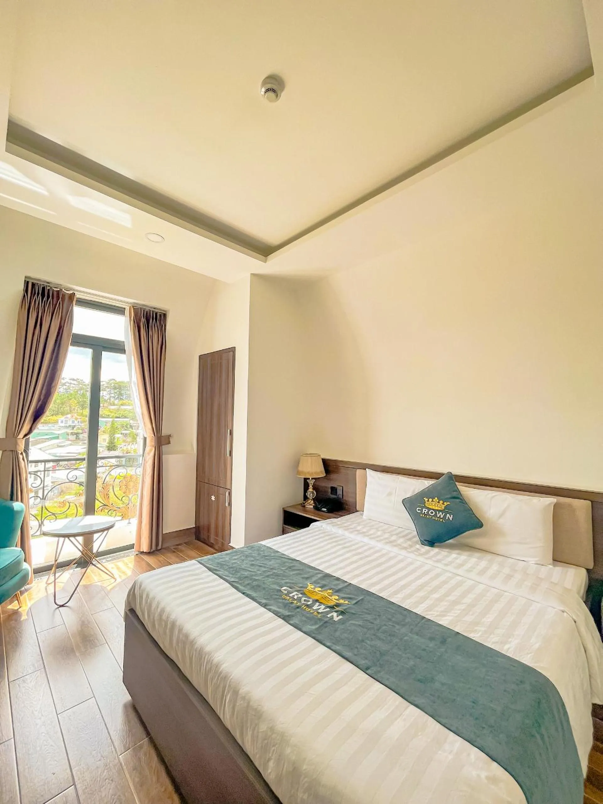 Bed in Crown Dalat Hotel