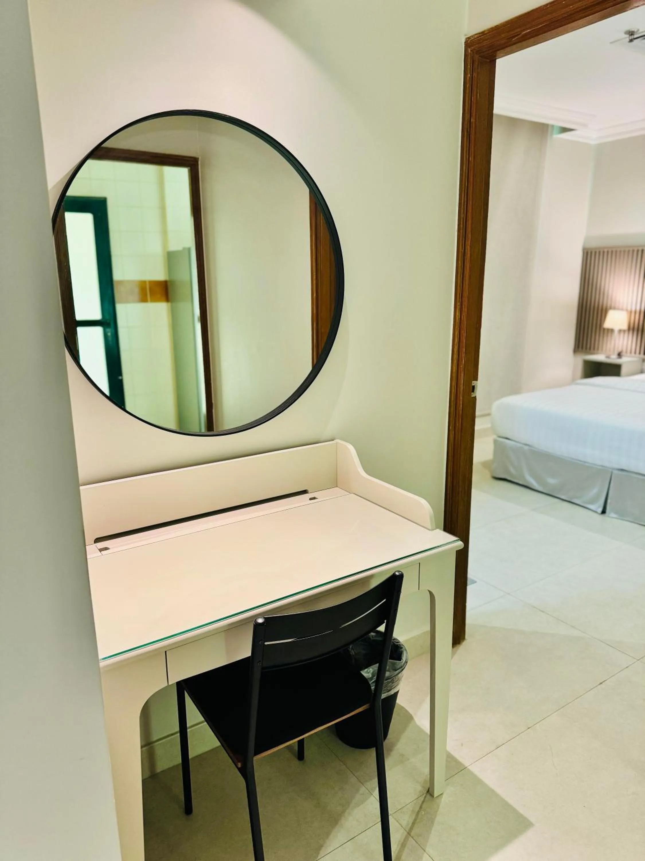 Seating area, Bed in Times Square Suite Hotel