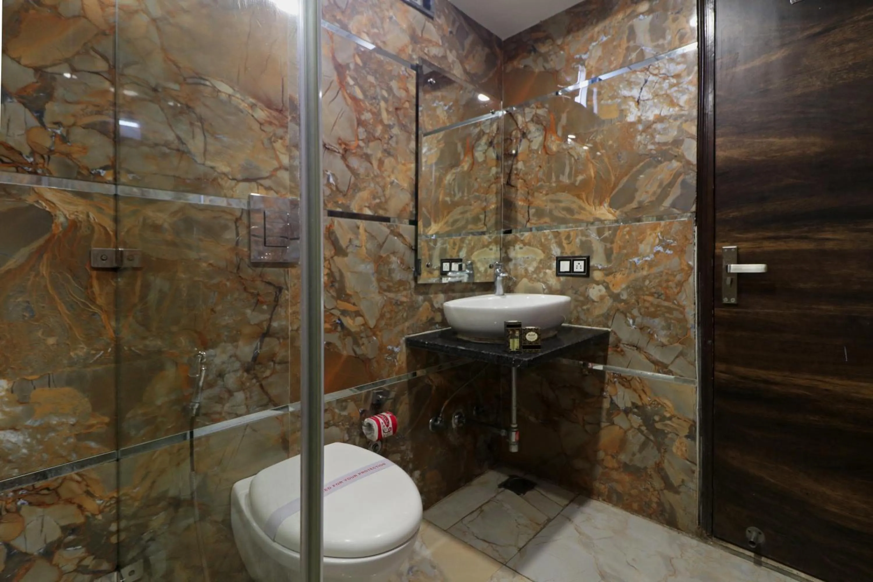 Shower in Hotel Mannat international by Mannat