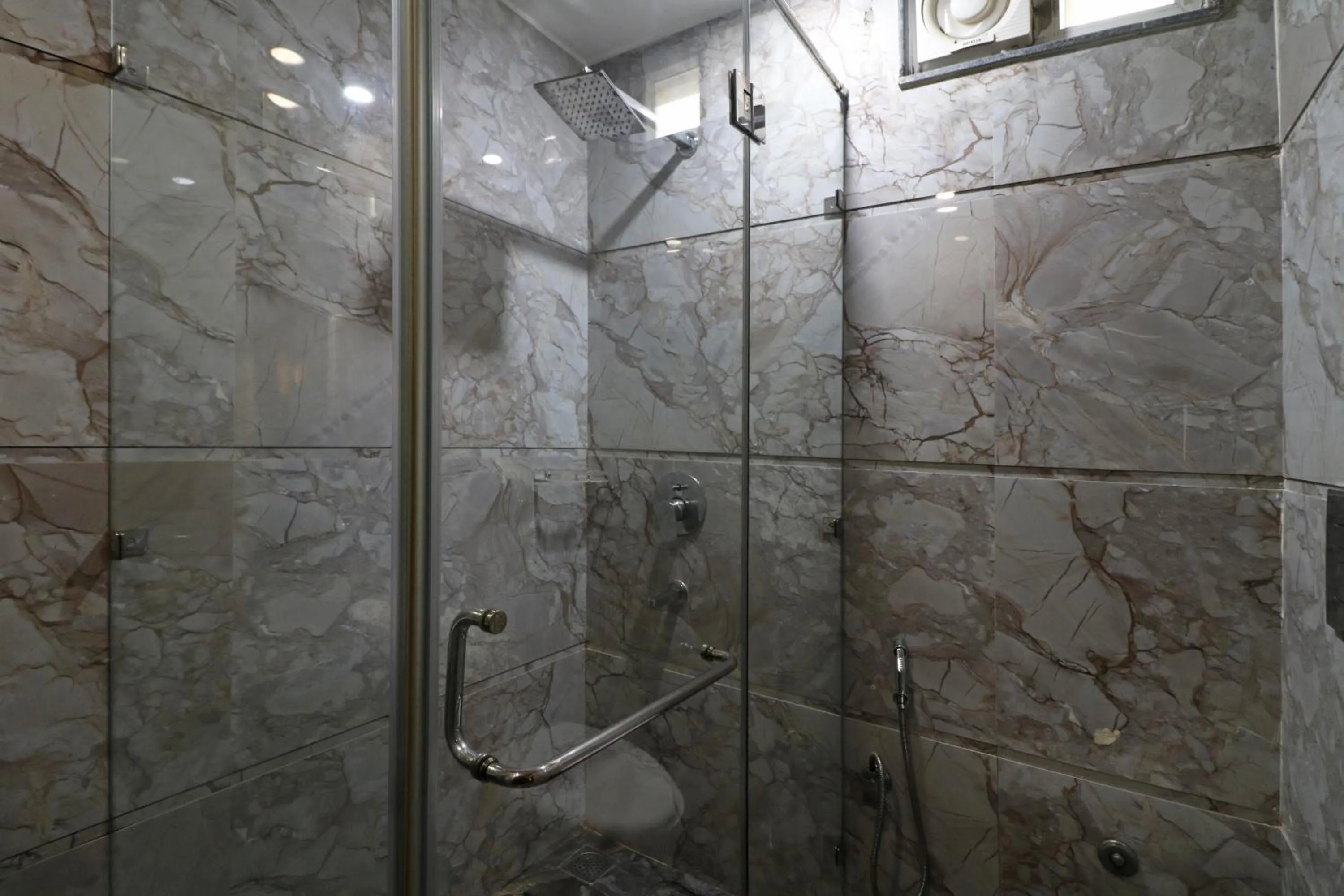Shower in Hotel Mannat international by Mannat