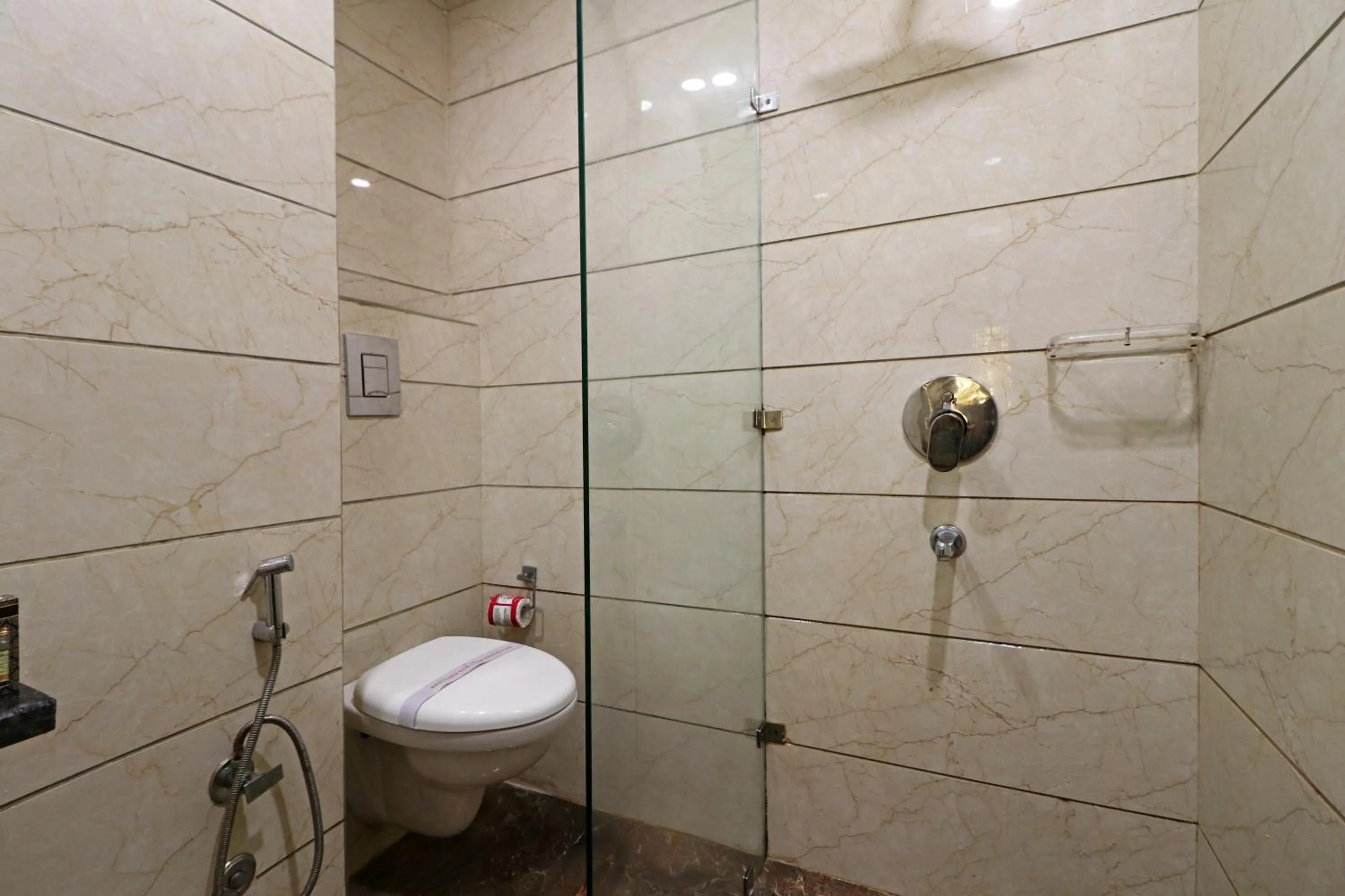 Bathroom in Hotel Mannat international by Mannat