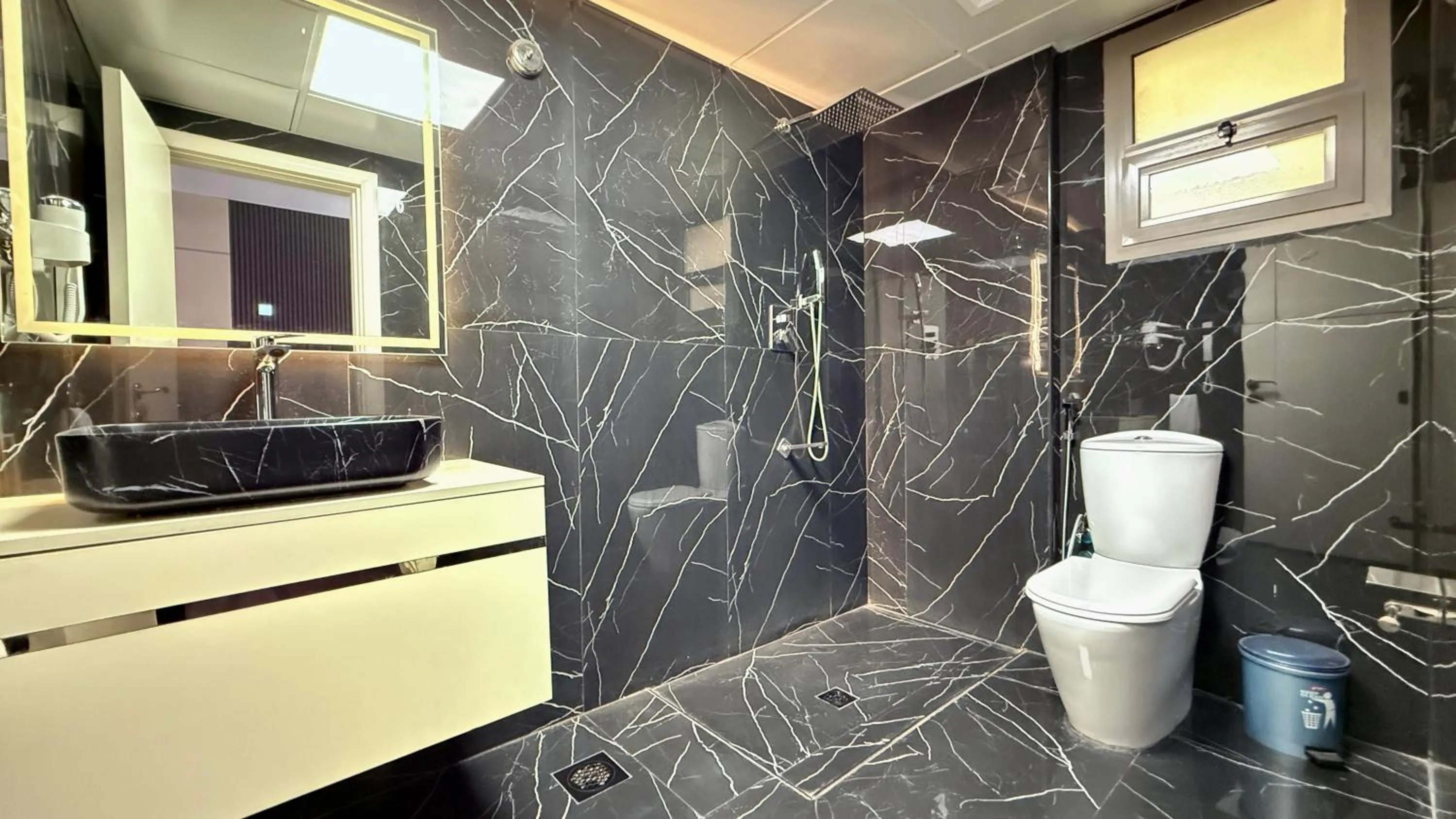 Bathroom in Palette Sharjah Aparthotel formerly Royal Tulip