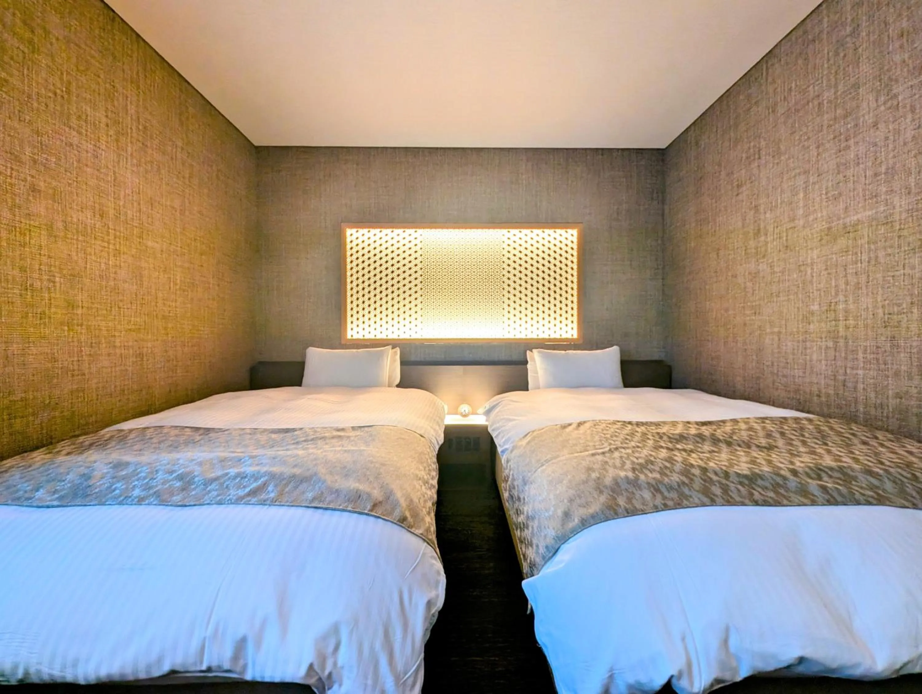 Bed in ひがし茶屋街らしく金沢 Hotel Rashiku kanazawa
