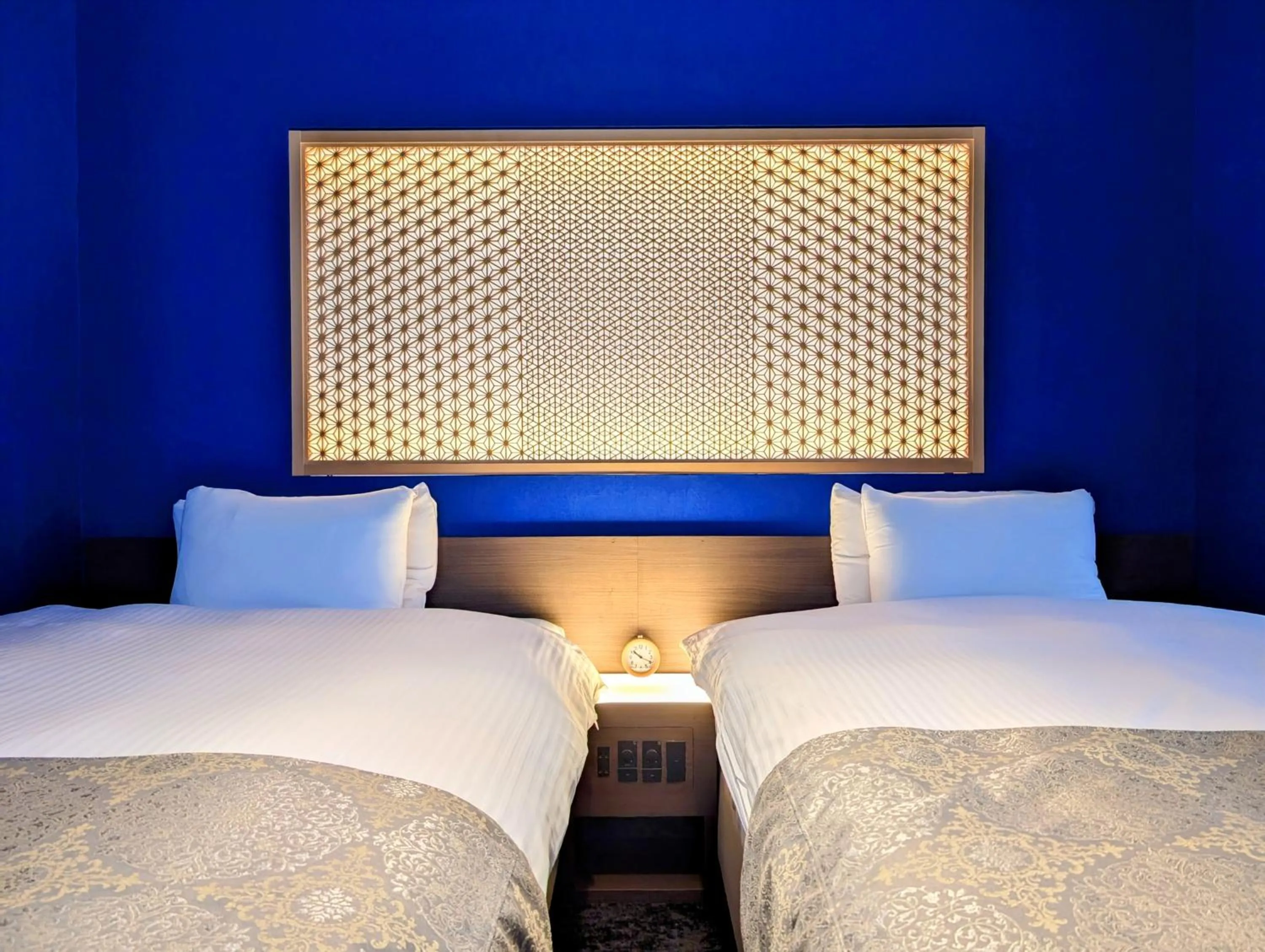 Bed in ひがし茶屋街らしく金沢 Hotel Rashiku kanazawa