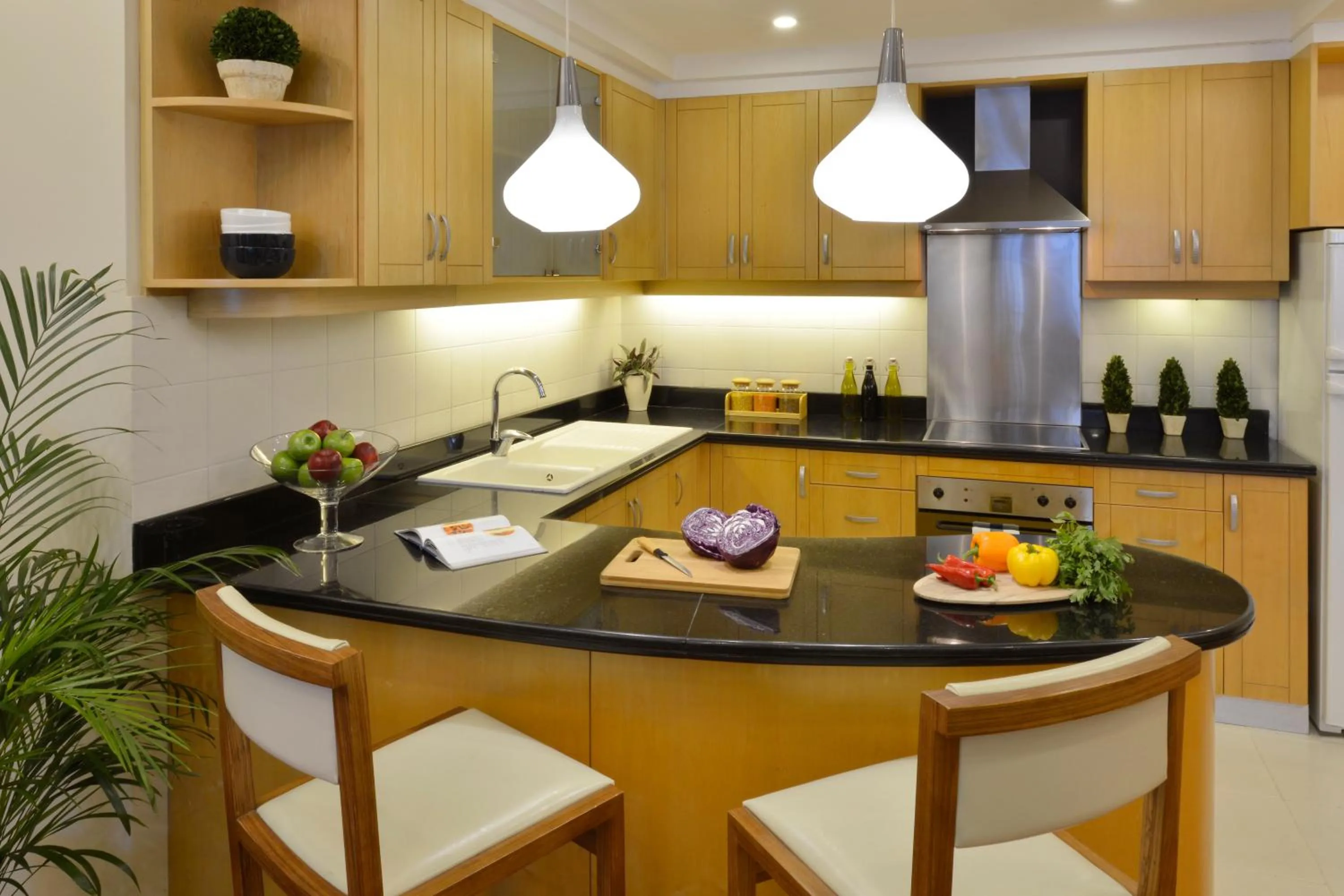 Kitchen or kitchenette in Somerset Al Fateh Bahrain