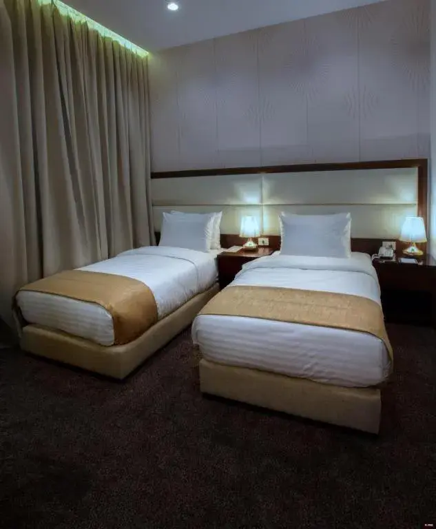 Bed in Seas Hotel Amman