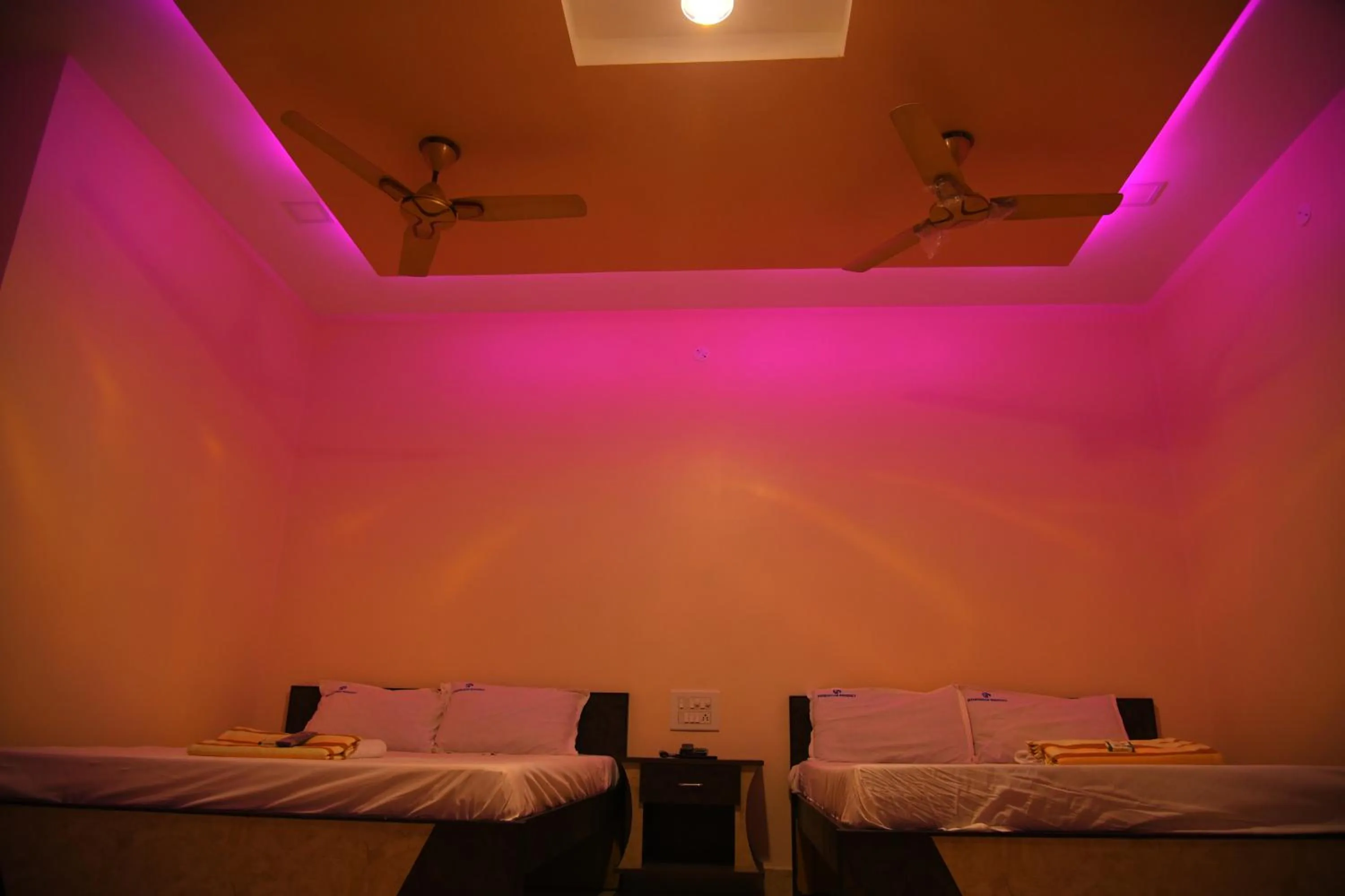 Photo of the whole room, Bed in Sivamurugan residency