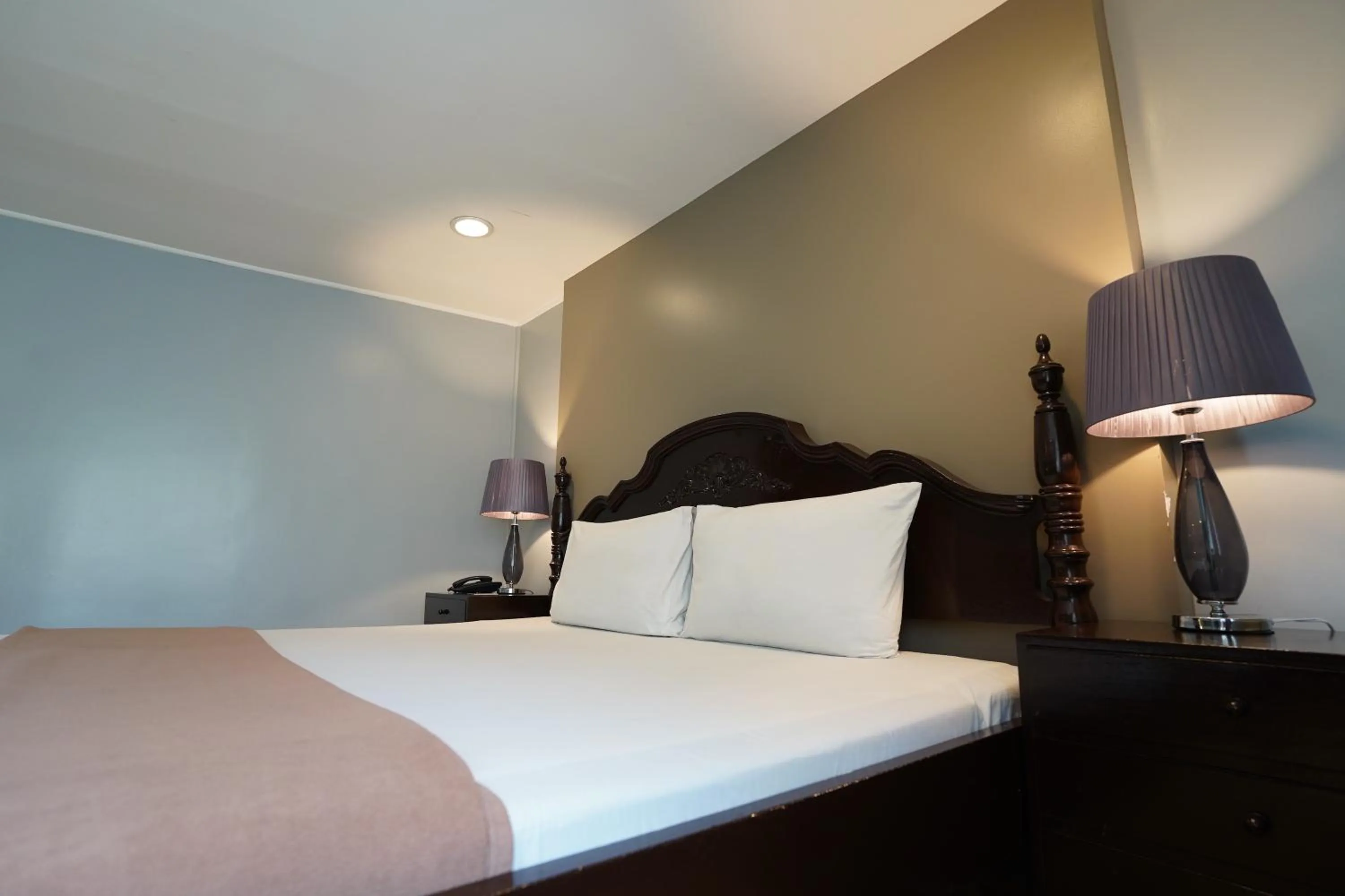 Bed in Arzo Hotel Manila