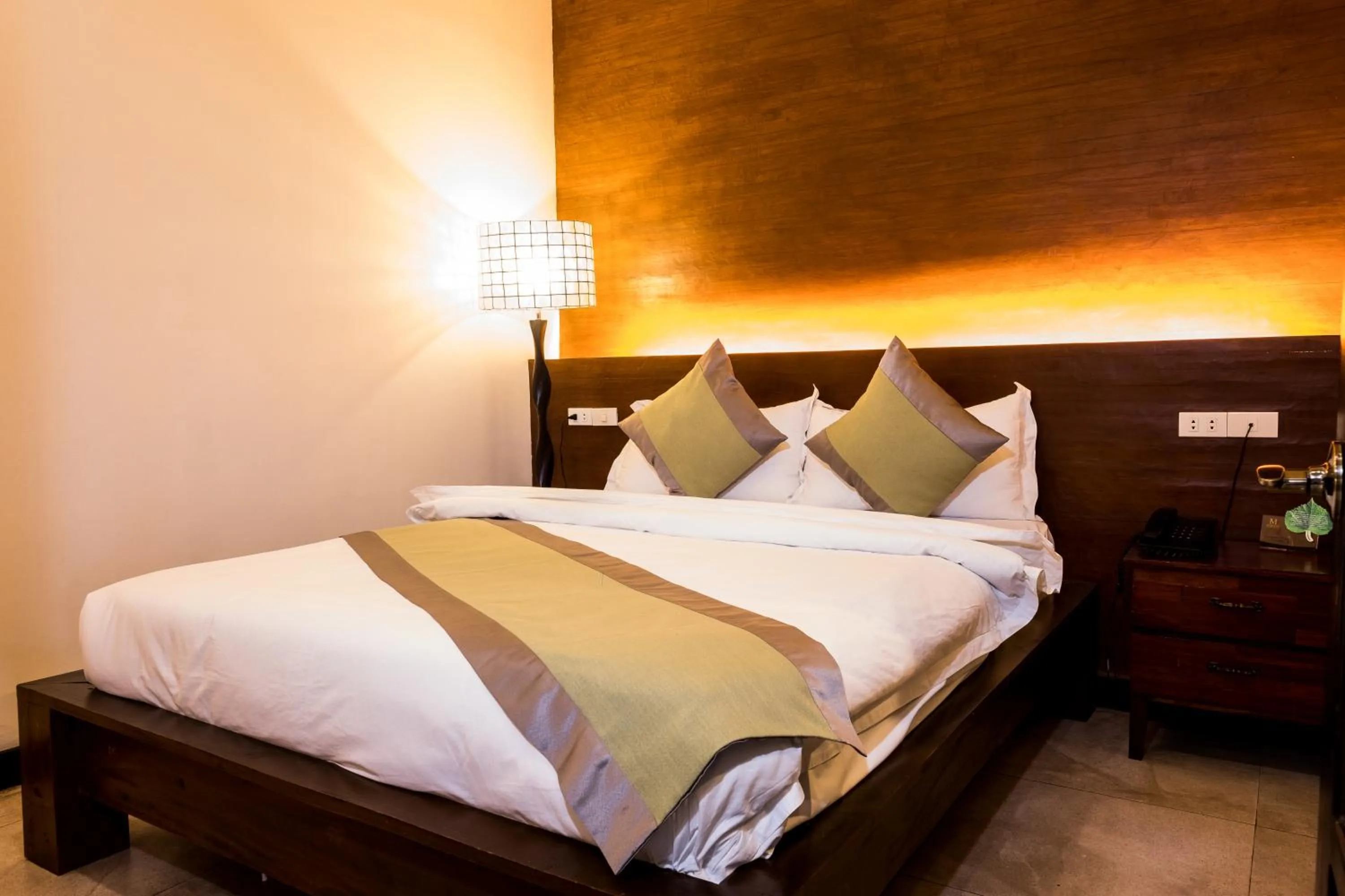 Bed in Marcian Garden Hotel