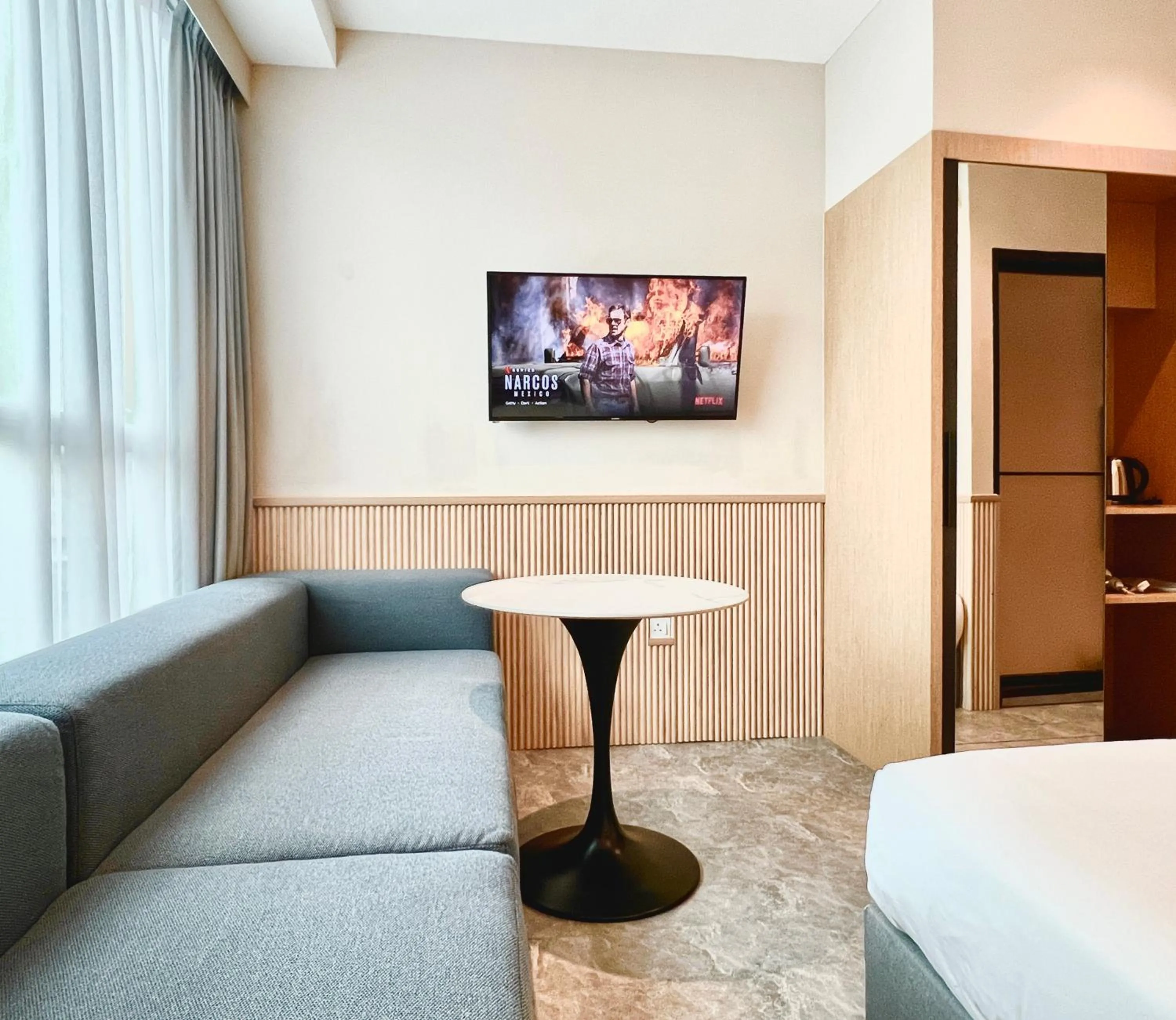 Seating area in Harper Boutique Hotel at Sutera Avenue