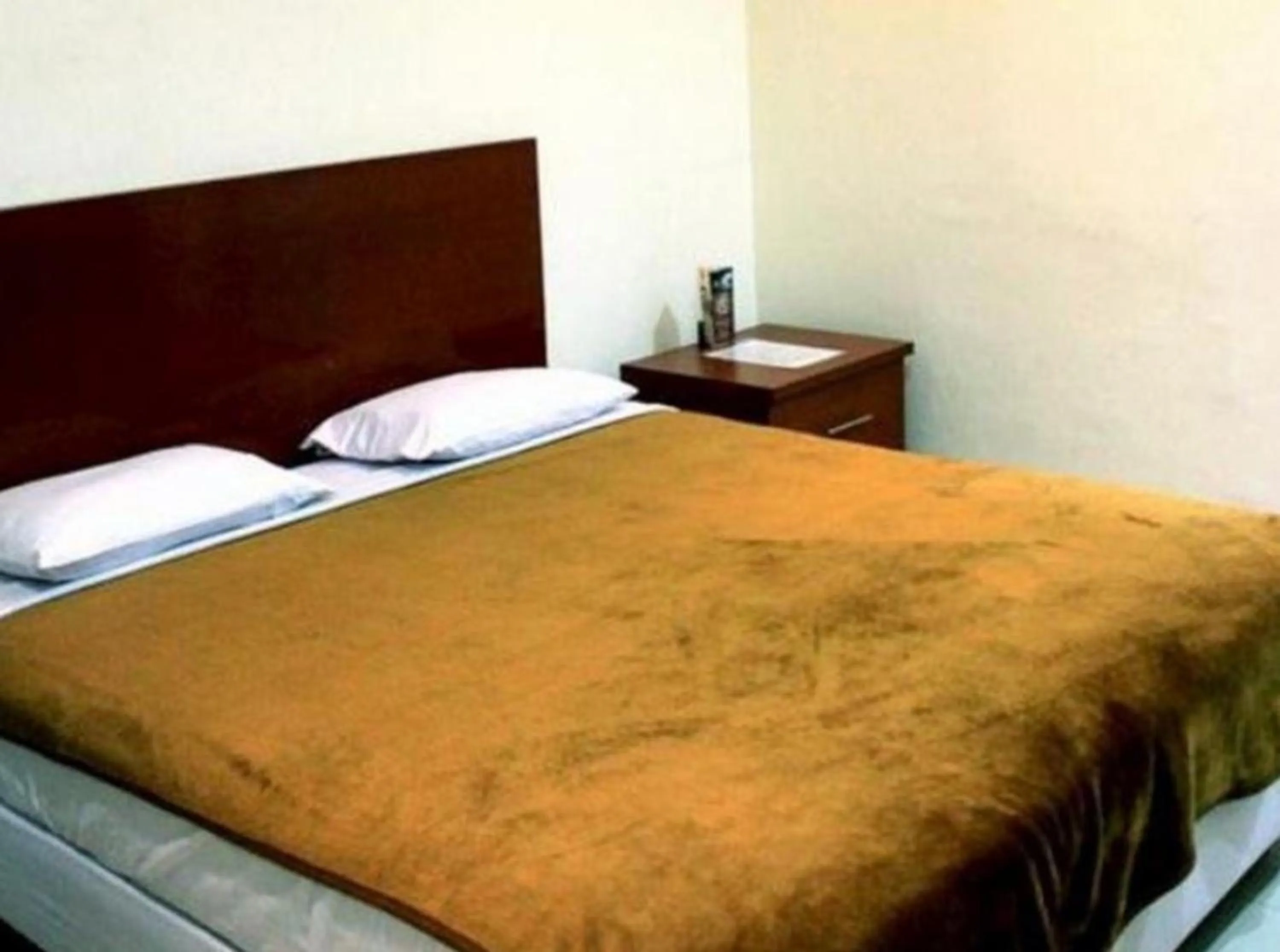 Photo of the whole room, Bed in Soerabaja Place Guest House