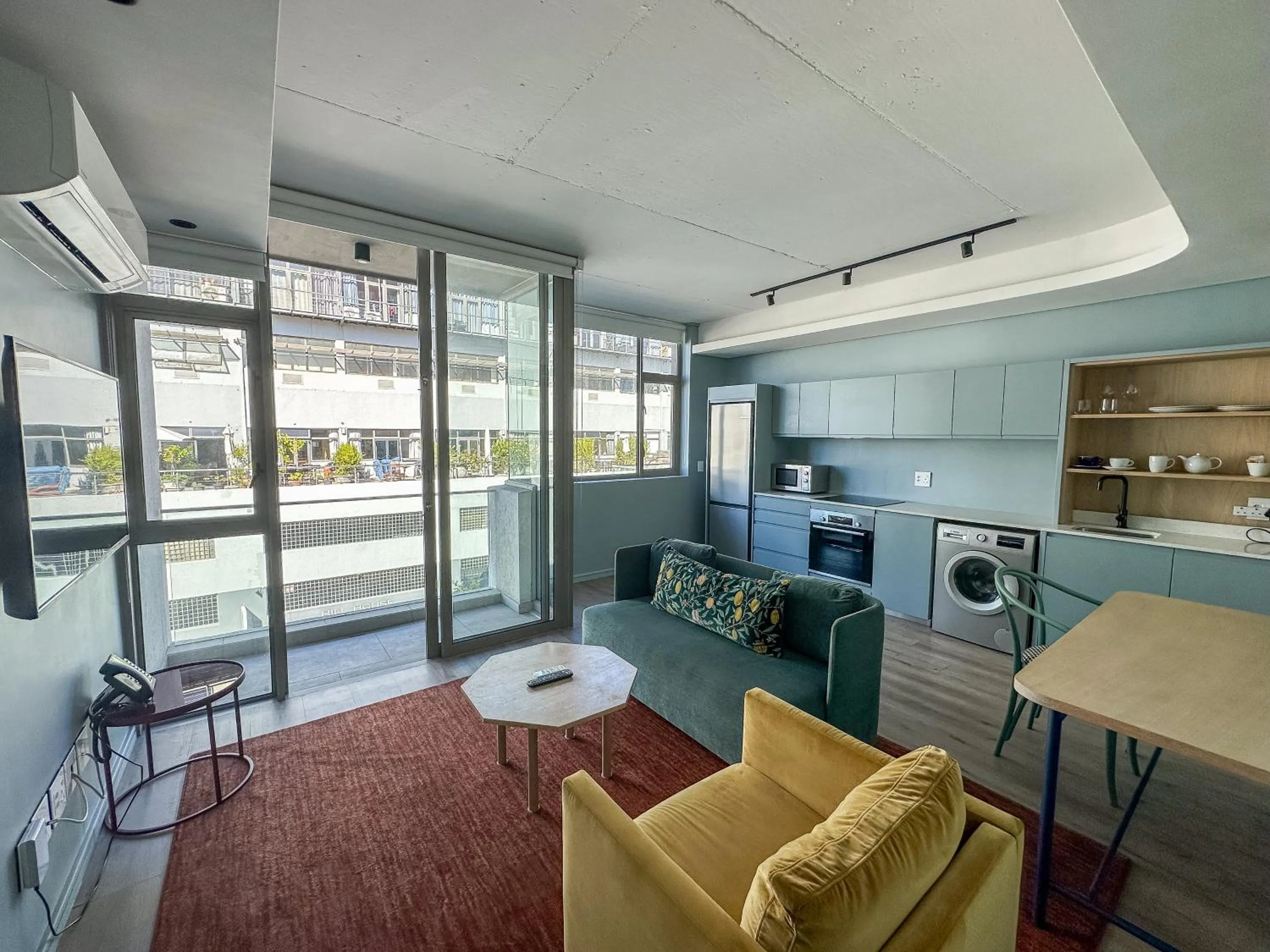 Seating area in Home Suite Hotels De Waterkant