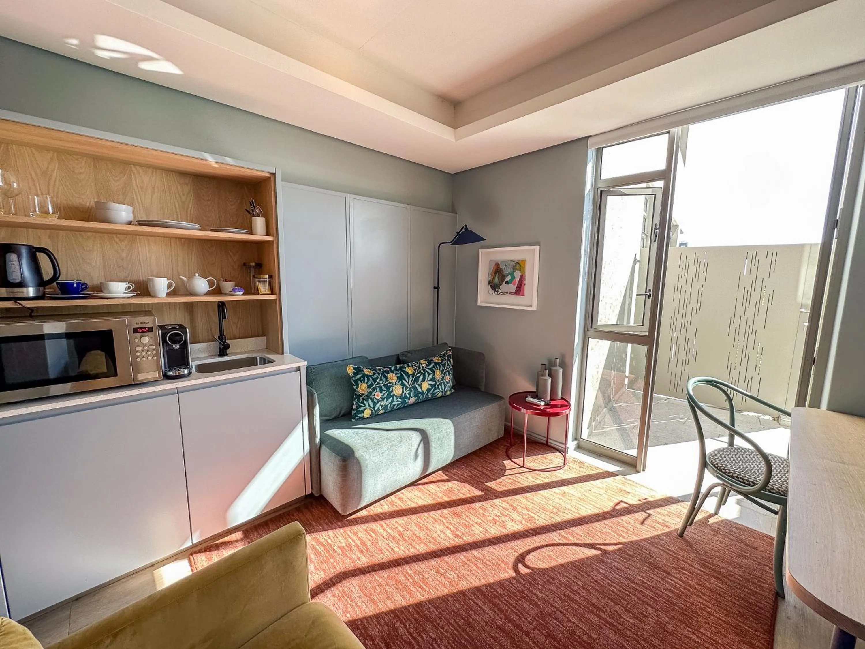 Seating area in Home Suite Hotels De Waterkant