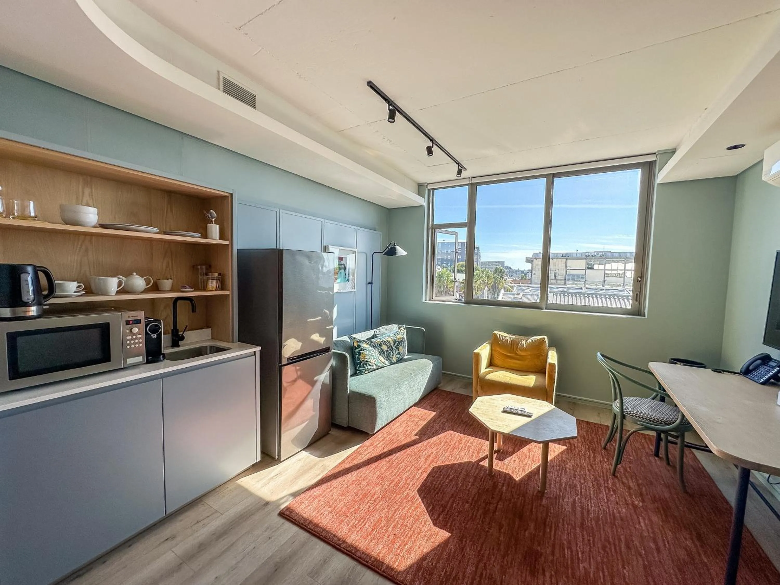 Seating area in Home Suite Hotels De Waterkant