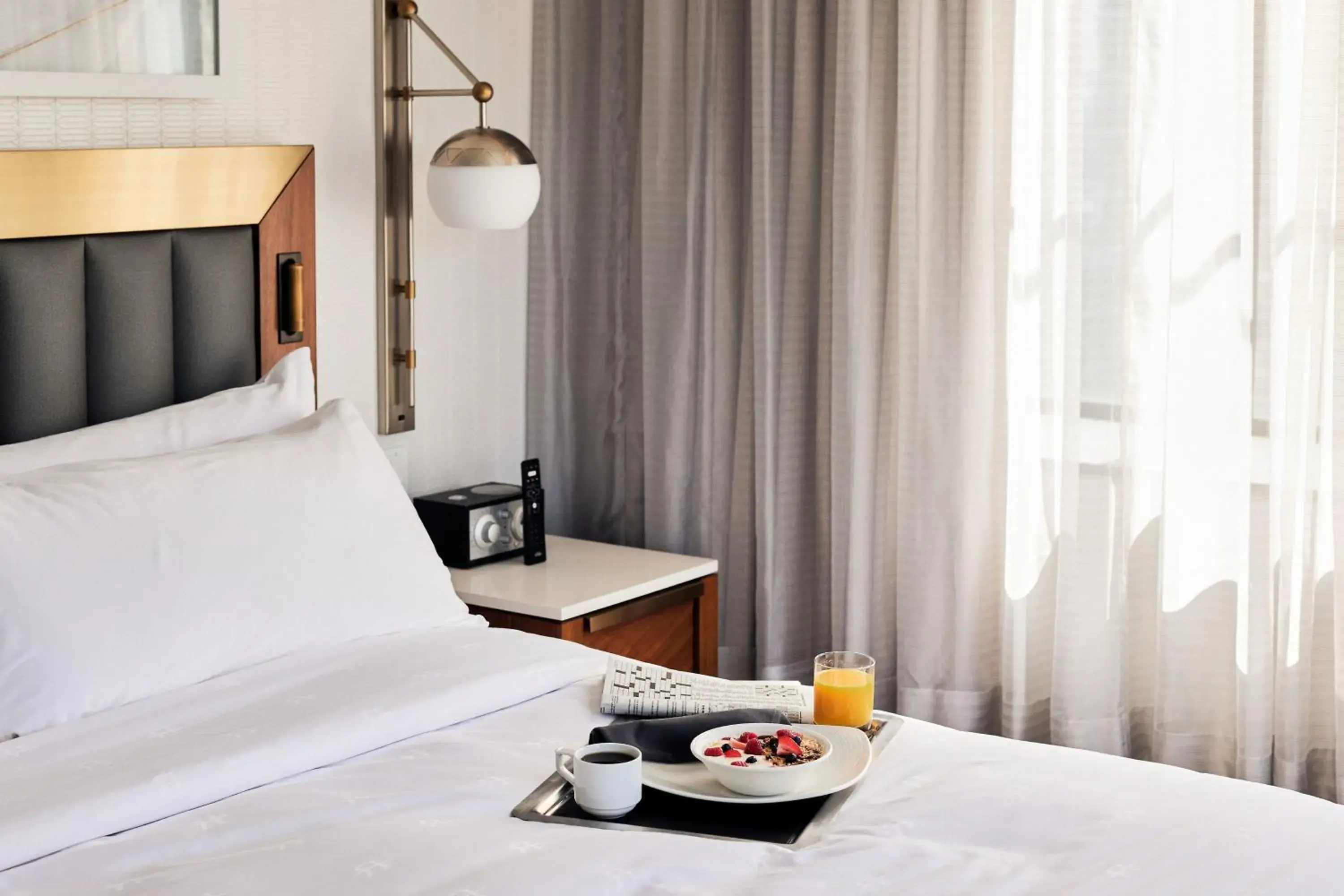 Bed in Rand Tower Hotel, Minneapolis, a Tribute Portfolio Hotel Bed in Rand Tower Hotel, Minneapolis, a Tribute Portfolio Hotel