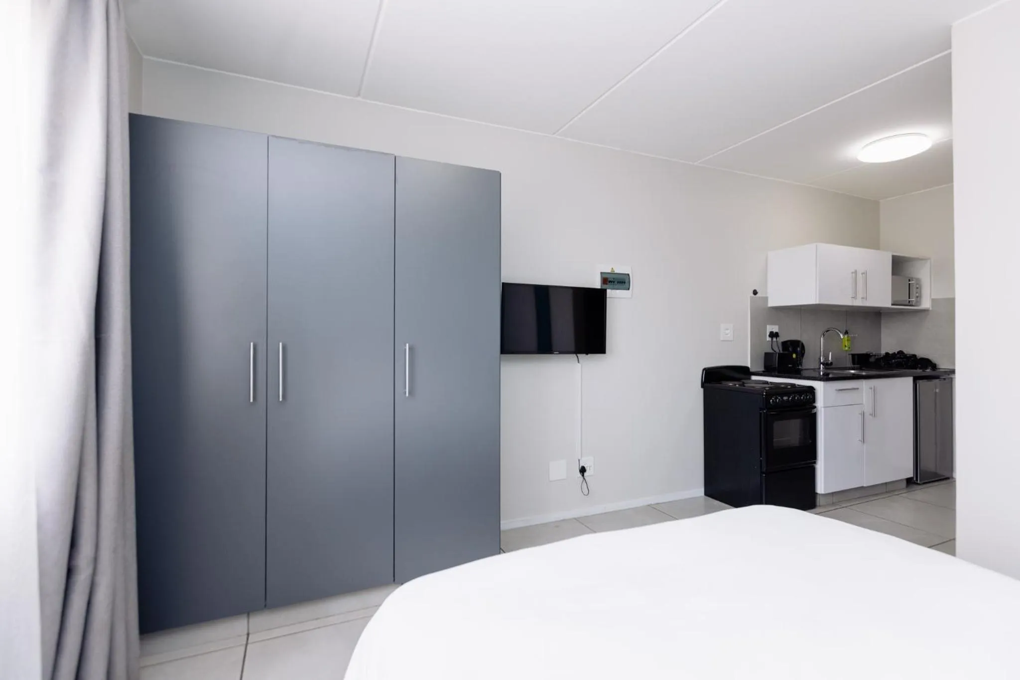 wardrobe, Bed in MINT Express Sandton View