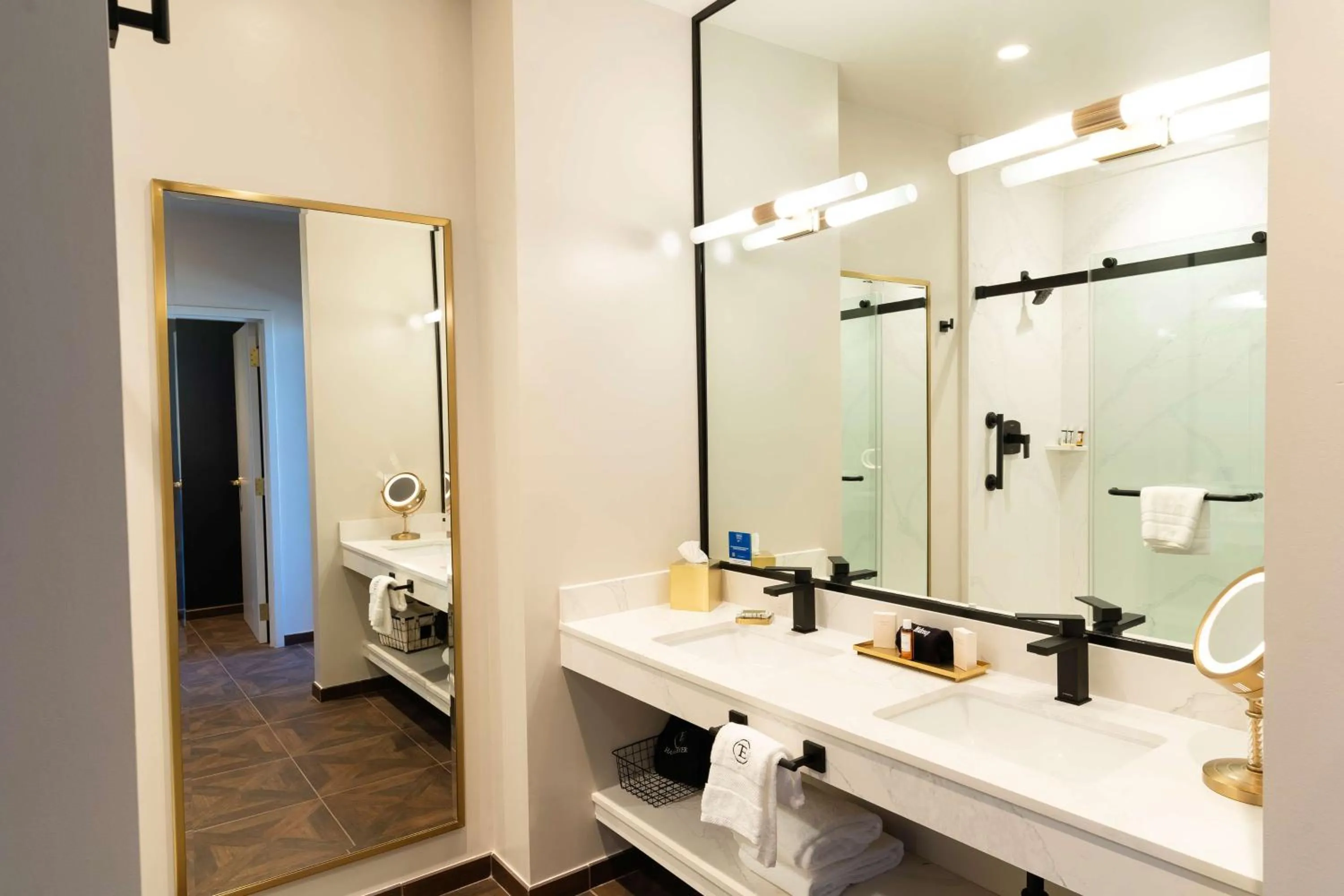 Bathroom in The Exchange Sacramento, Curio Collection By Hilton