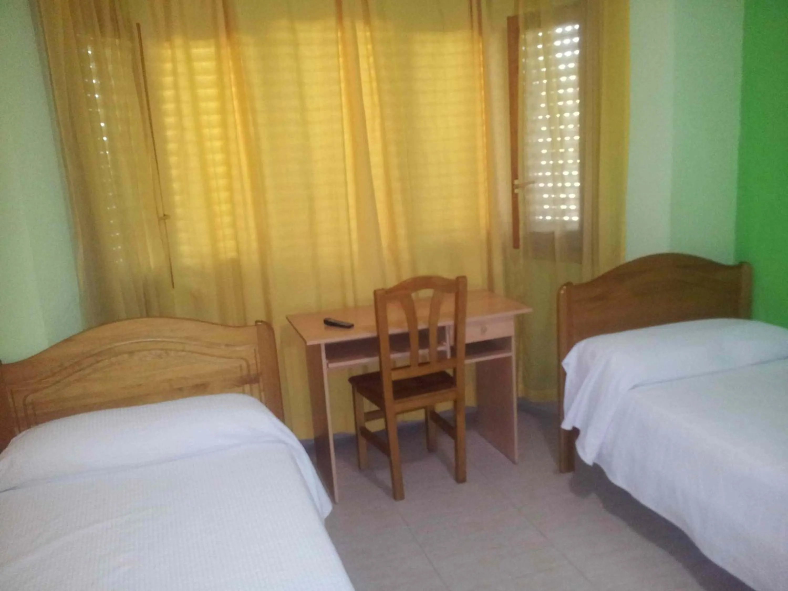 Bed in Hostal El Alba