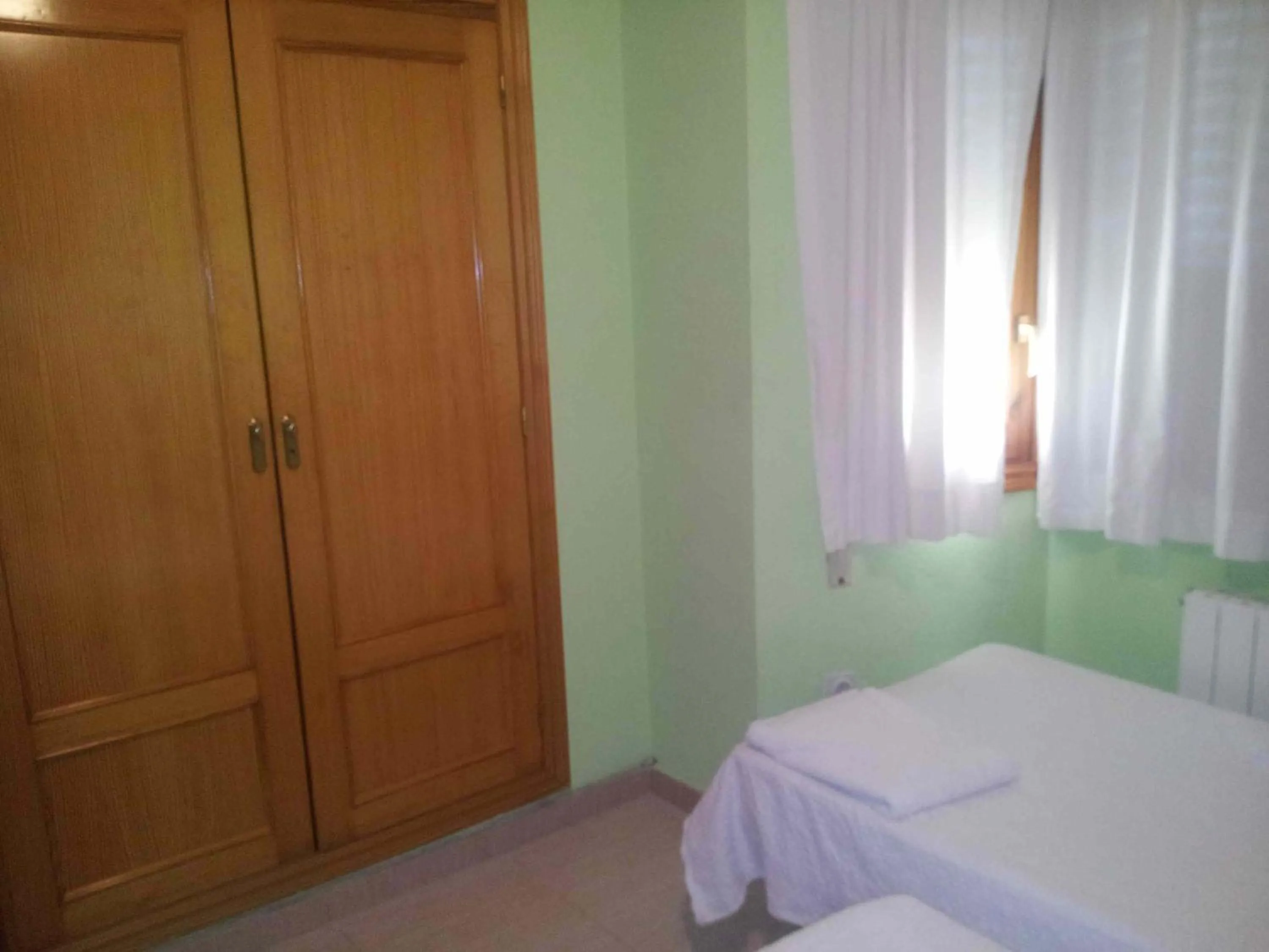 Bed in Hostal El Alba