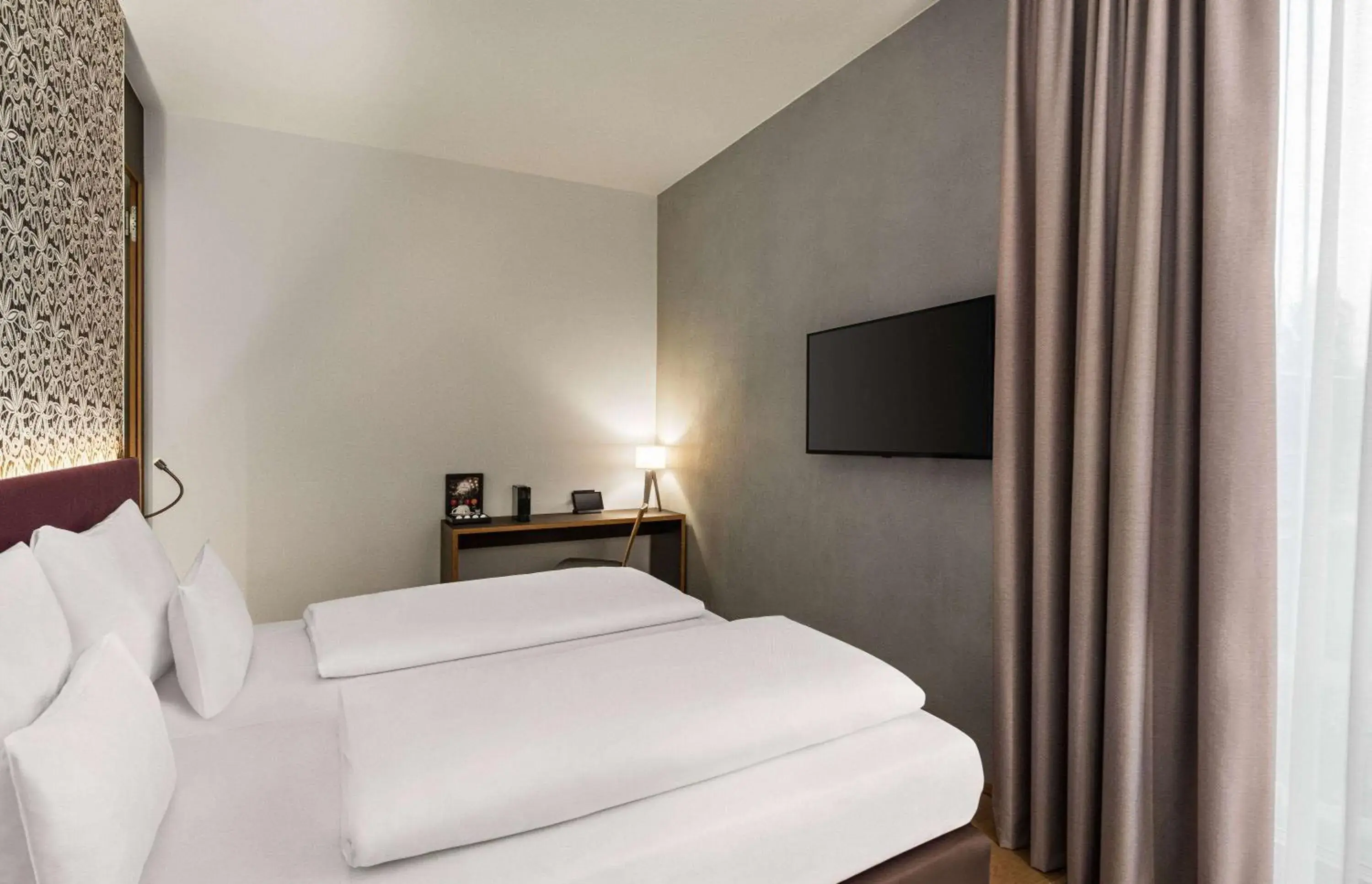 Photo of the whole room, Bed in Amedia Lustenau, Trademark Collection by Wyndham Photo of the whole room, Bed in Amedia Lustenau, Trademark Collection by Wyndham