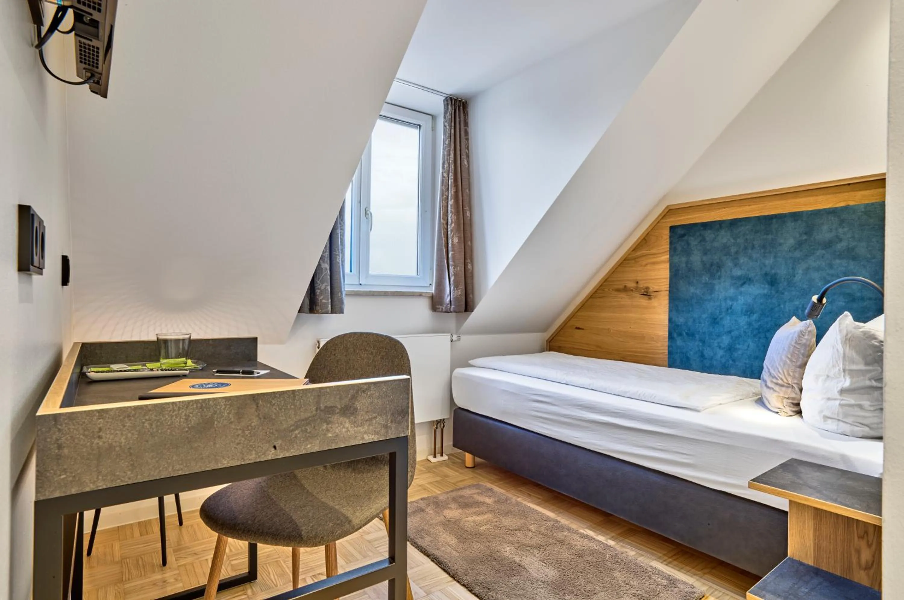 Photo of the whole room, Bed in Gasthaus Hotel Ostermeier