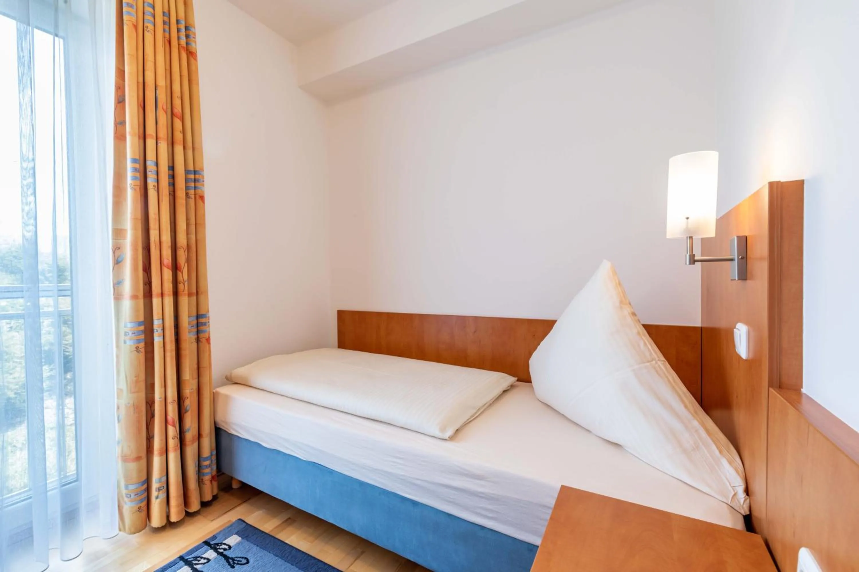 Bed in Gasthaus Hotel Ostermeier