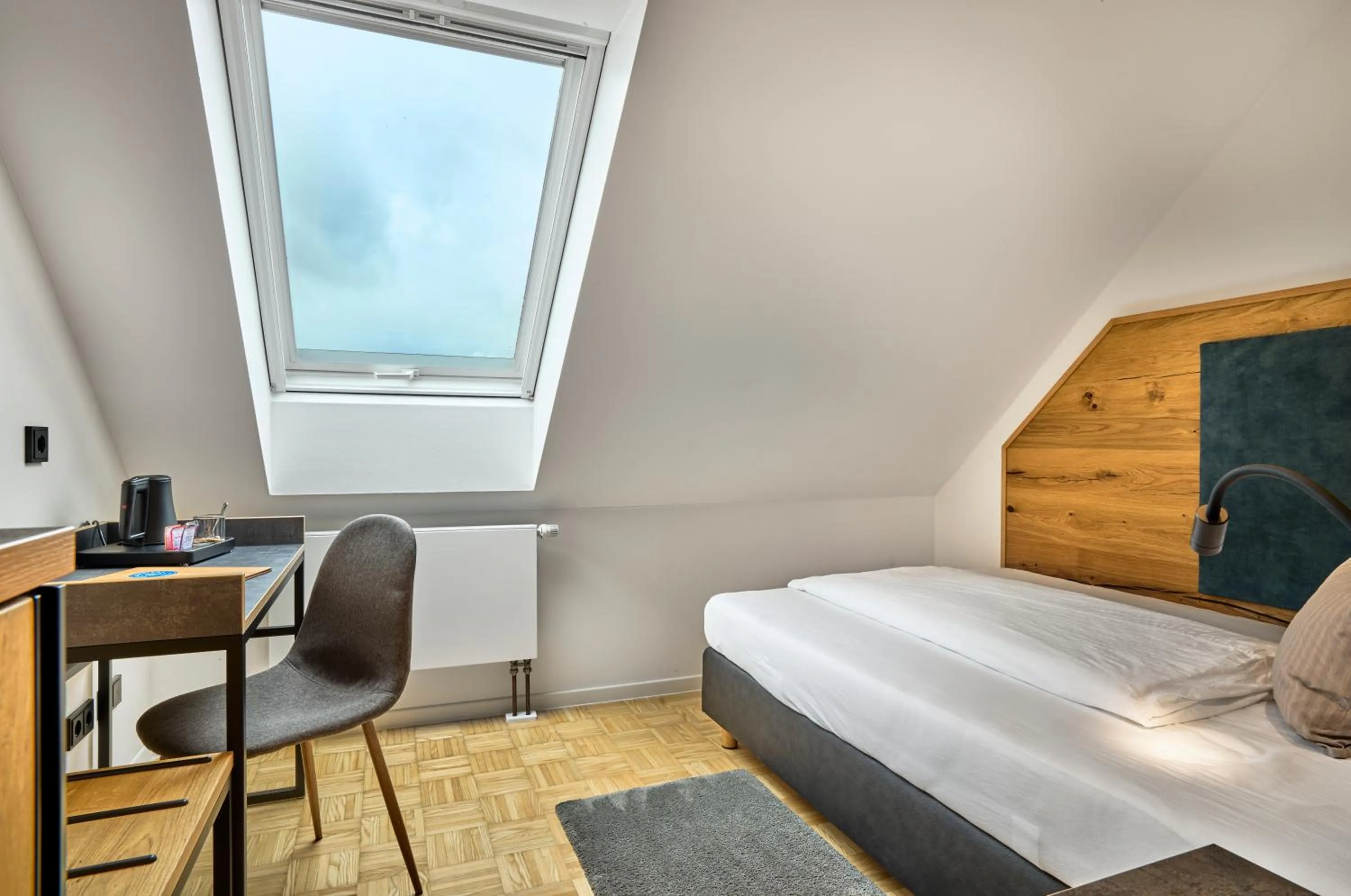 Photo of the whole room, Bed in Gasthaus Hotel Ostermeier