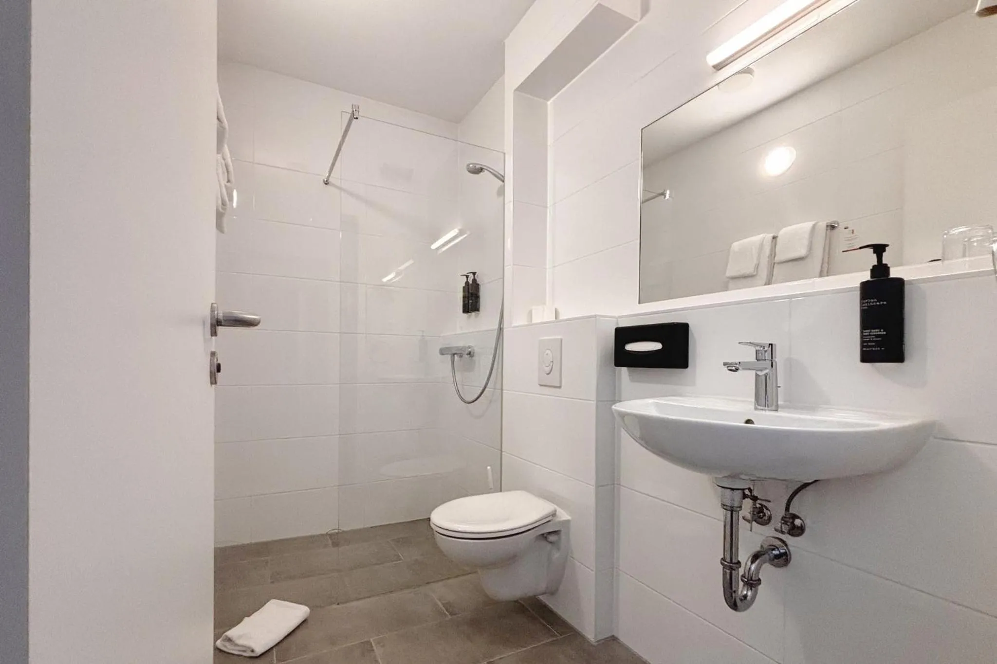 Bathroom in Garner Hotel Stuttgart - Zuffenhausen by IHG