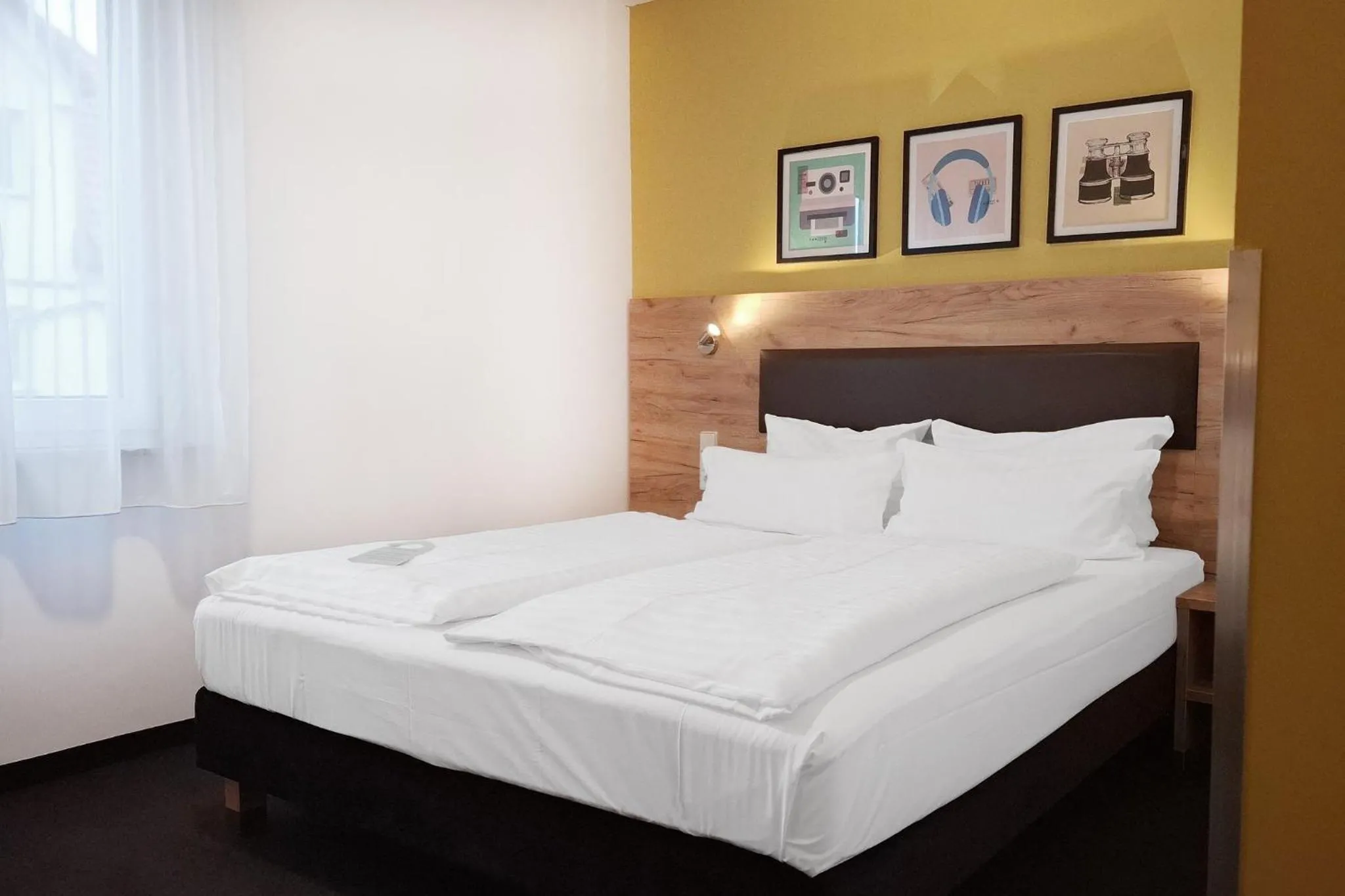 Photo of the whole room, Bed in Garner Hotel Stuttgart - Zuffenhausen by IHG