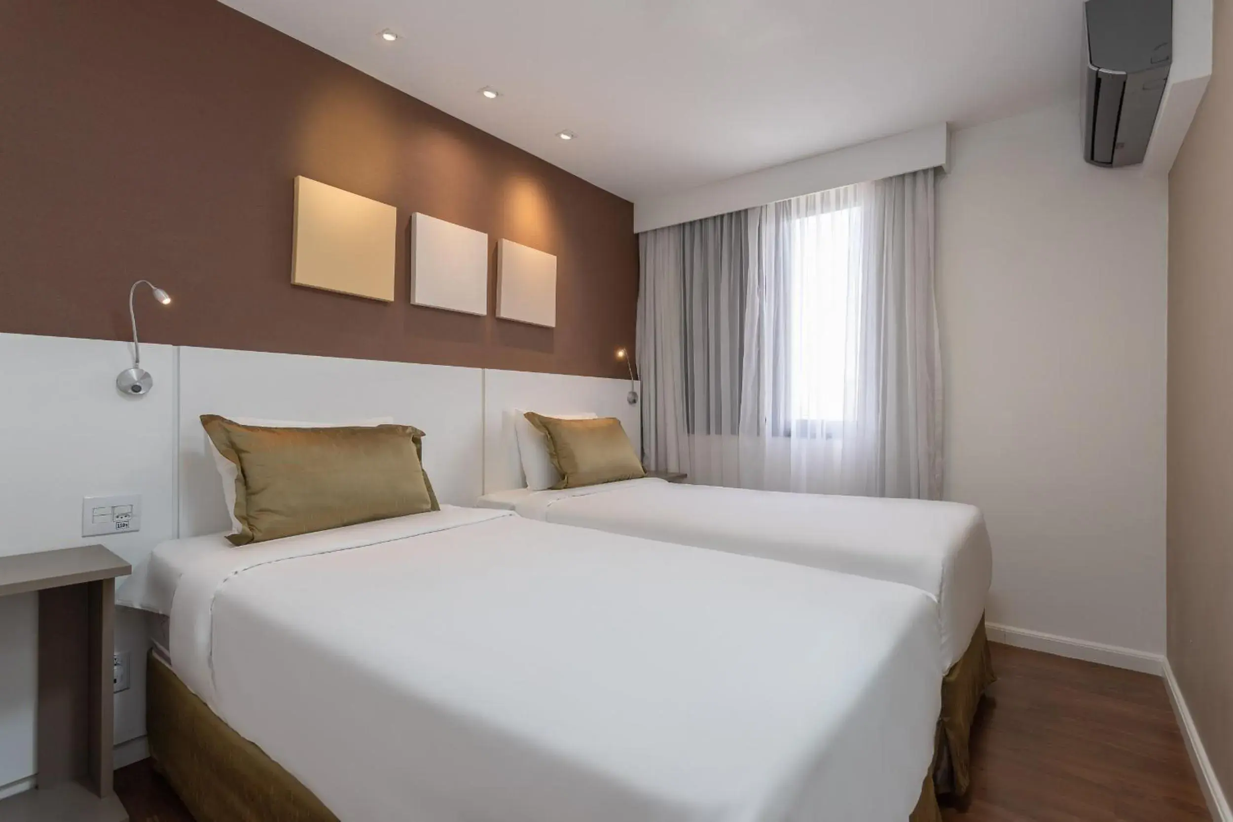 Bed in Paulista Suites by Charlie Bed in Paulista Suites by Charlie
