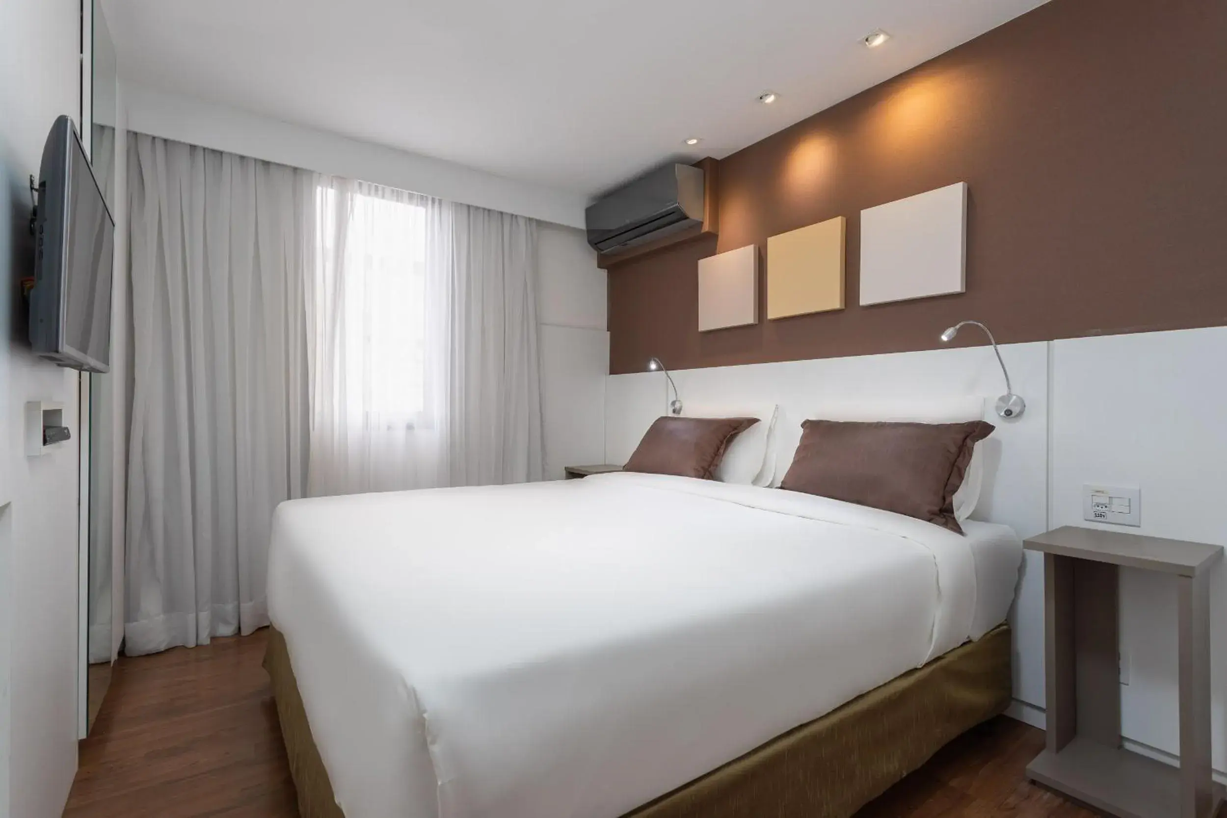 Bed in Paulista Suites by Charlie Bed in Paulista Suites by Charlie