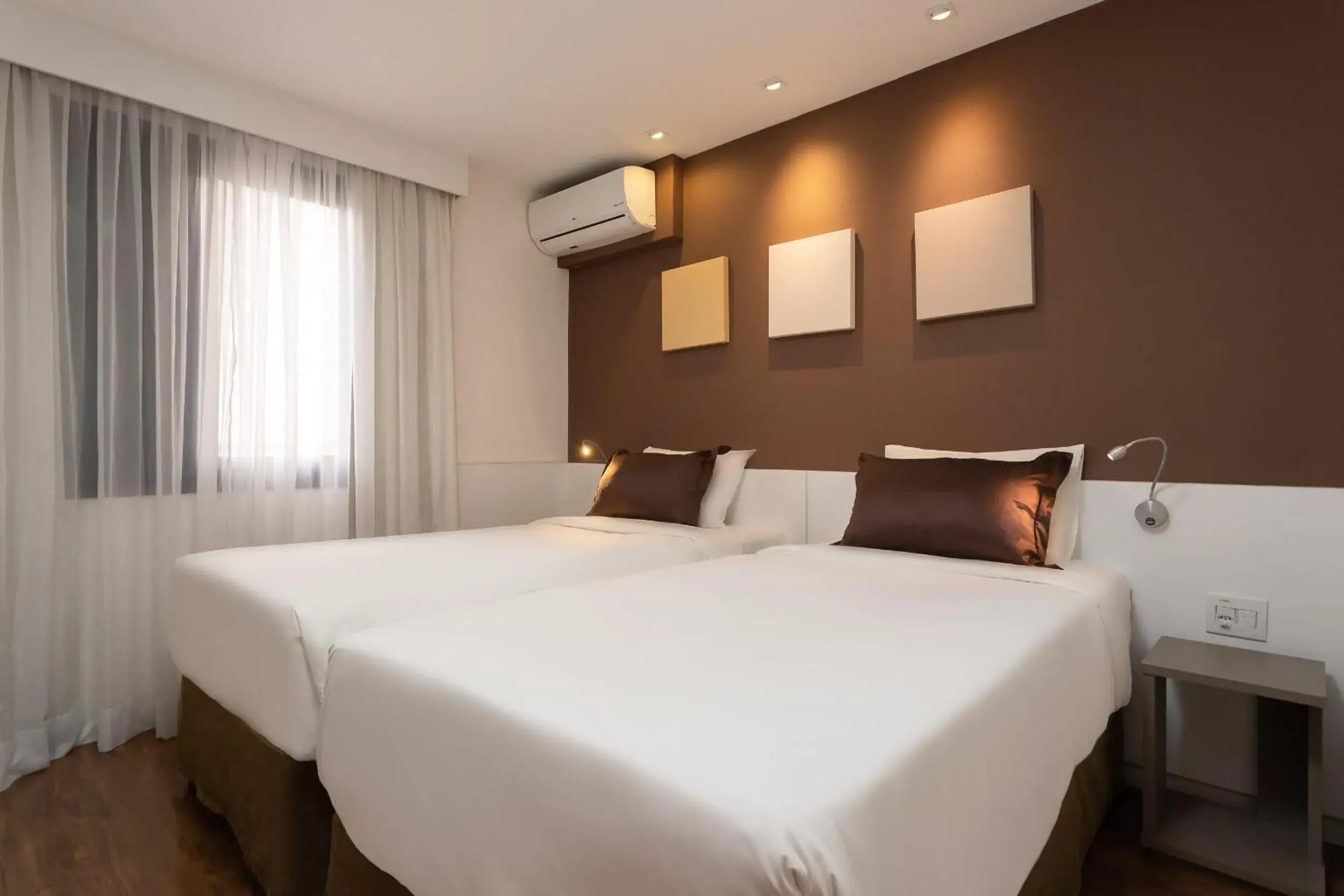 Bed in Paulista Suites by Charlie Bed in Paulista Suites by Charlie