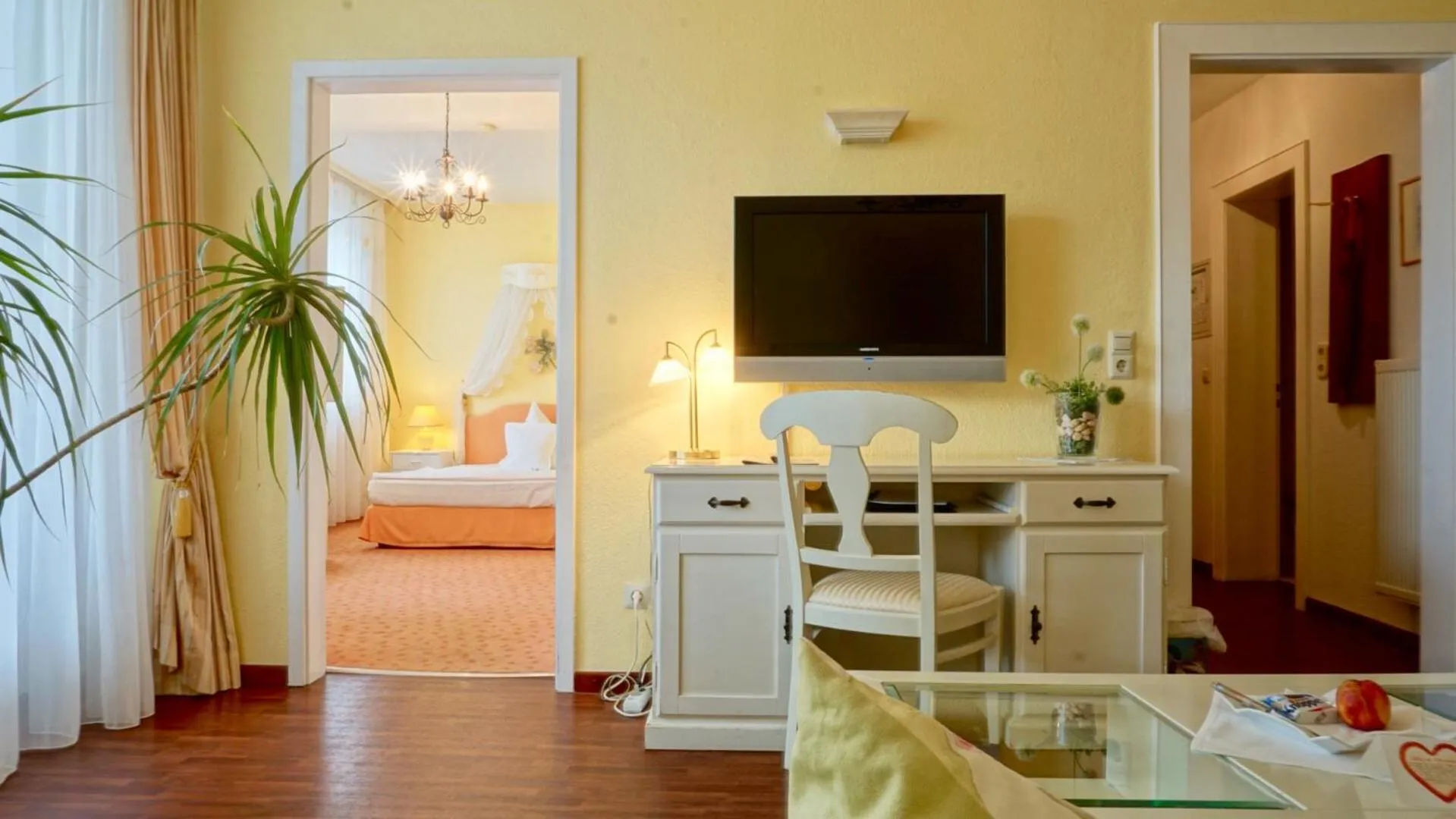 Living room, Bed in Hotel Alpha