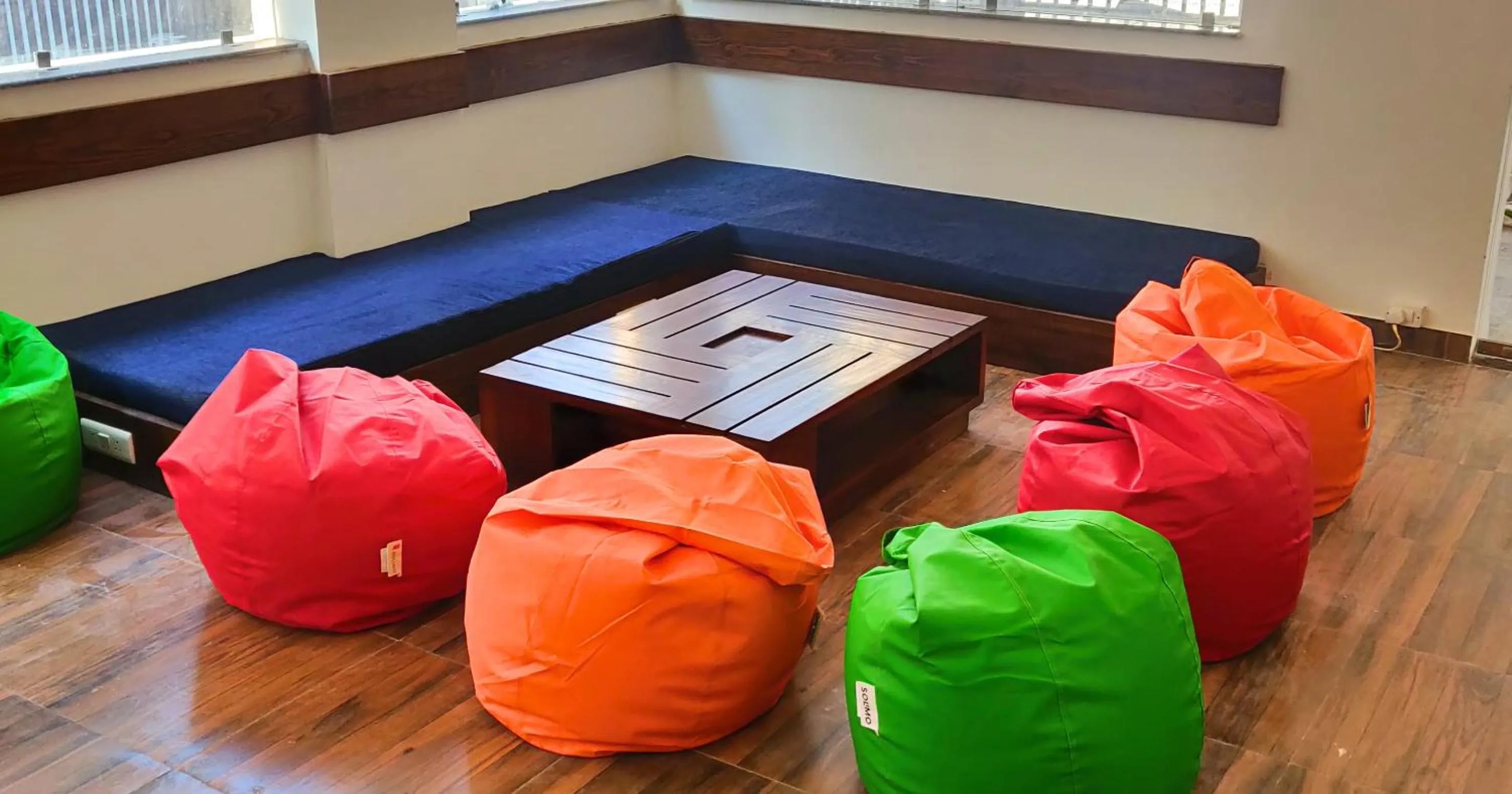 Communal lounge/ TV room, Bed in Joey's Hostel Rishikesh